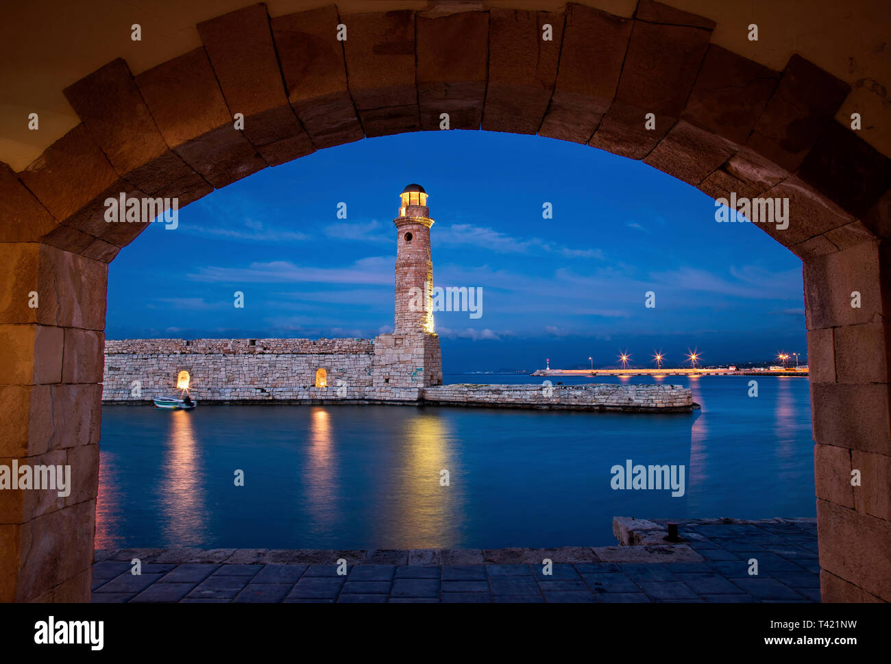 The beautiful lighthouse at the old port of Rethimno town, Crete, Greece. Stock Photo