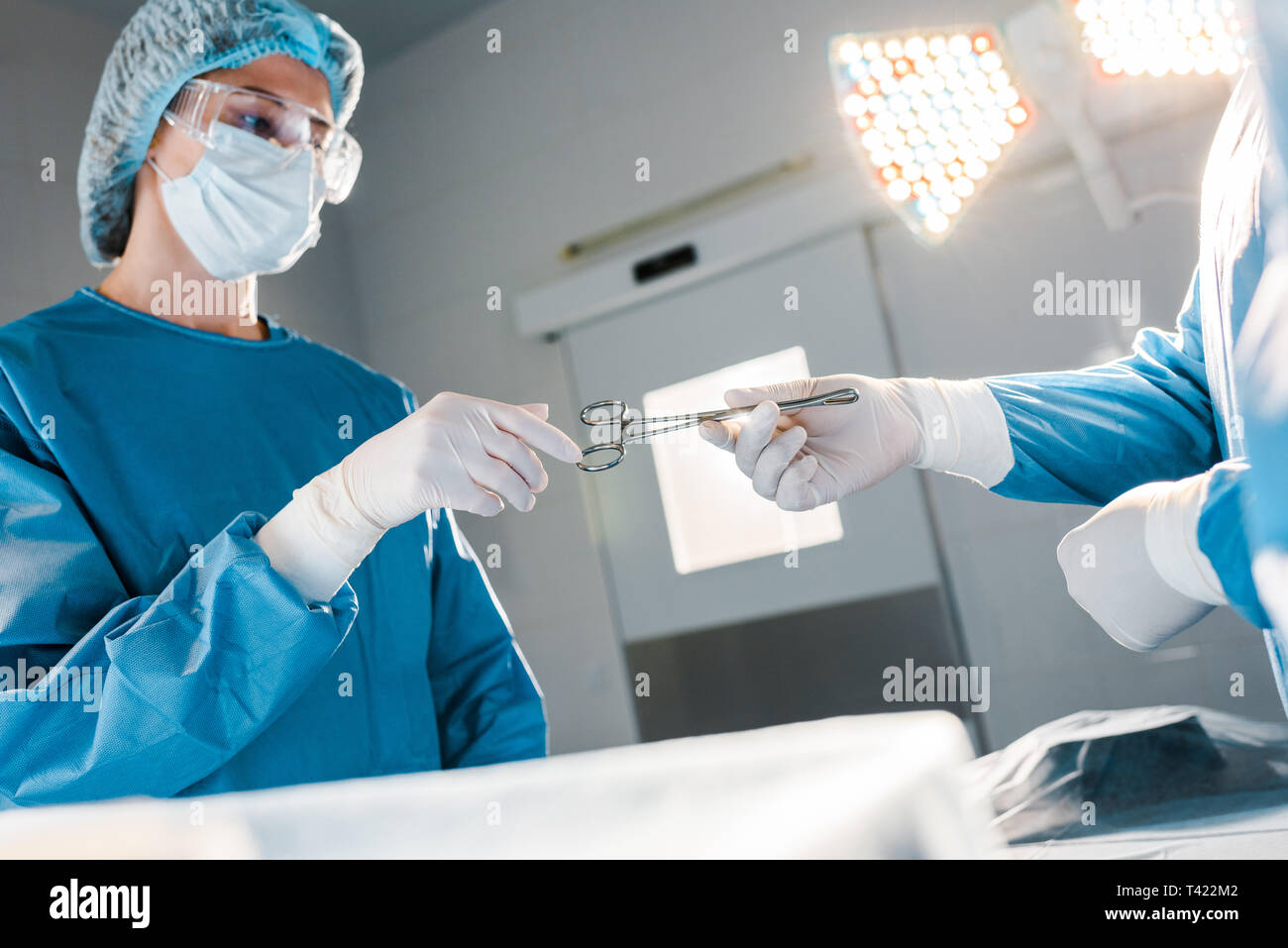 Doctor giving medical equipment hi-res stock photography and images - Alamy
