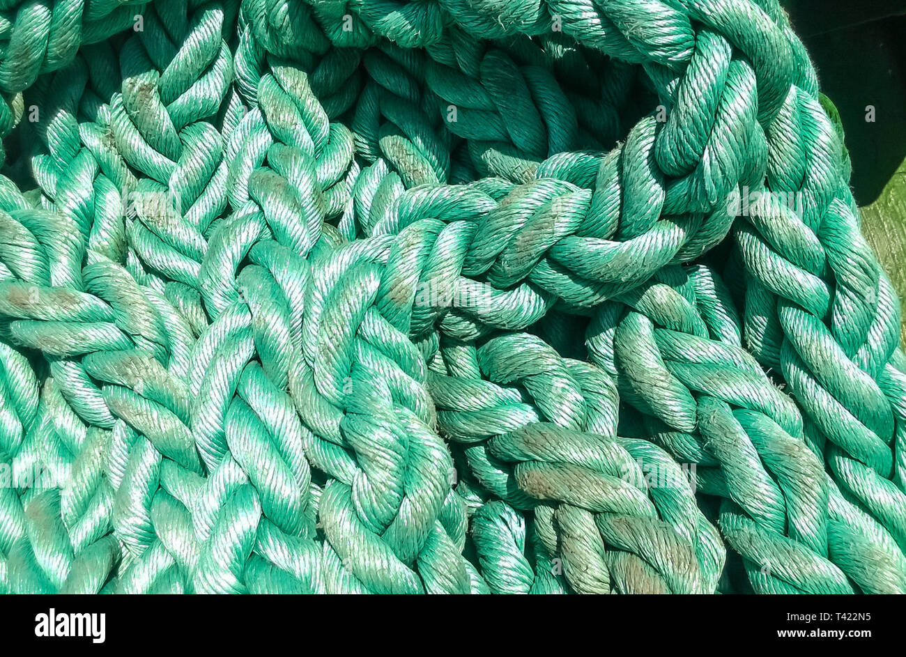 Port rope. Mooring rope. Rope for fastening ships and cargo. Stock Photo