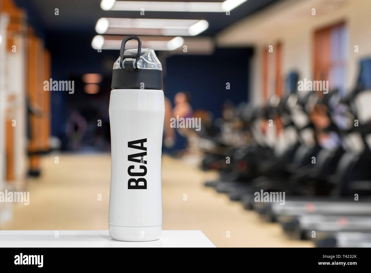 Plastic bottle or cup with Branched-chain amino acid drink close up Stock Photo