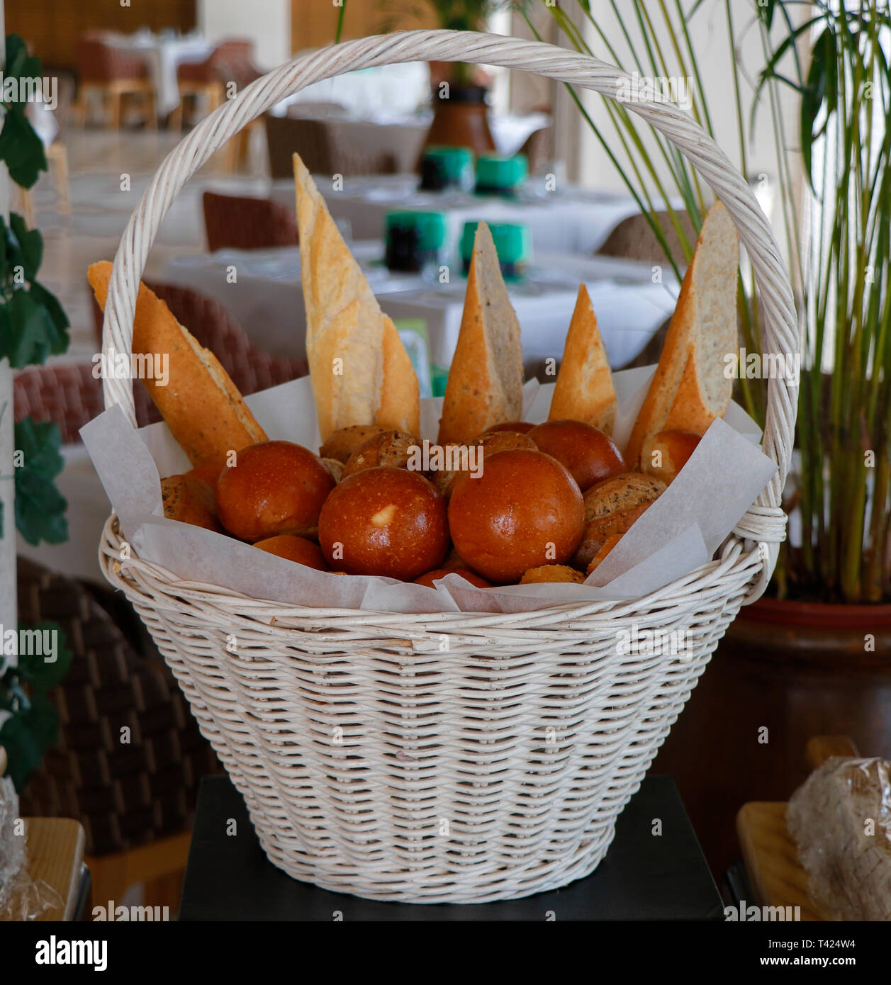 assorted breads in a basket Stock Photo