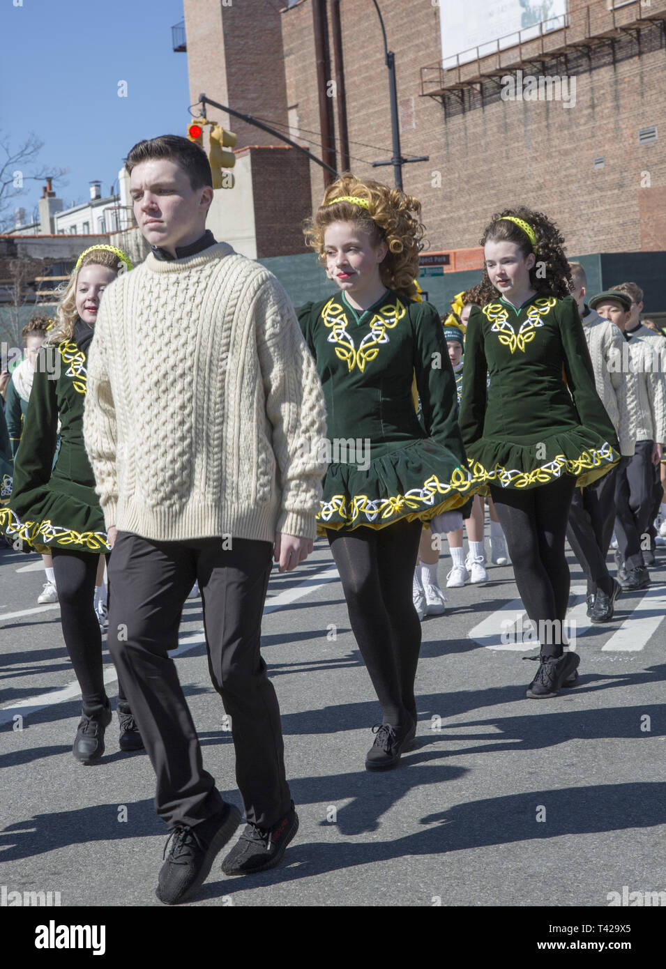 Local Saint Patrick's Day Parade is an annual event in the Park Slope Windsor Terrace neighborhood of Brooklyn, New York. Local Irish dance school students march and perform in the parade. Stock Photo