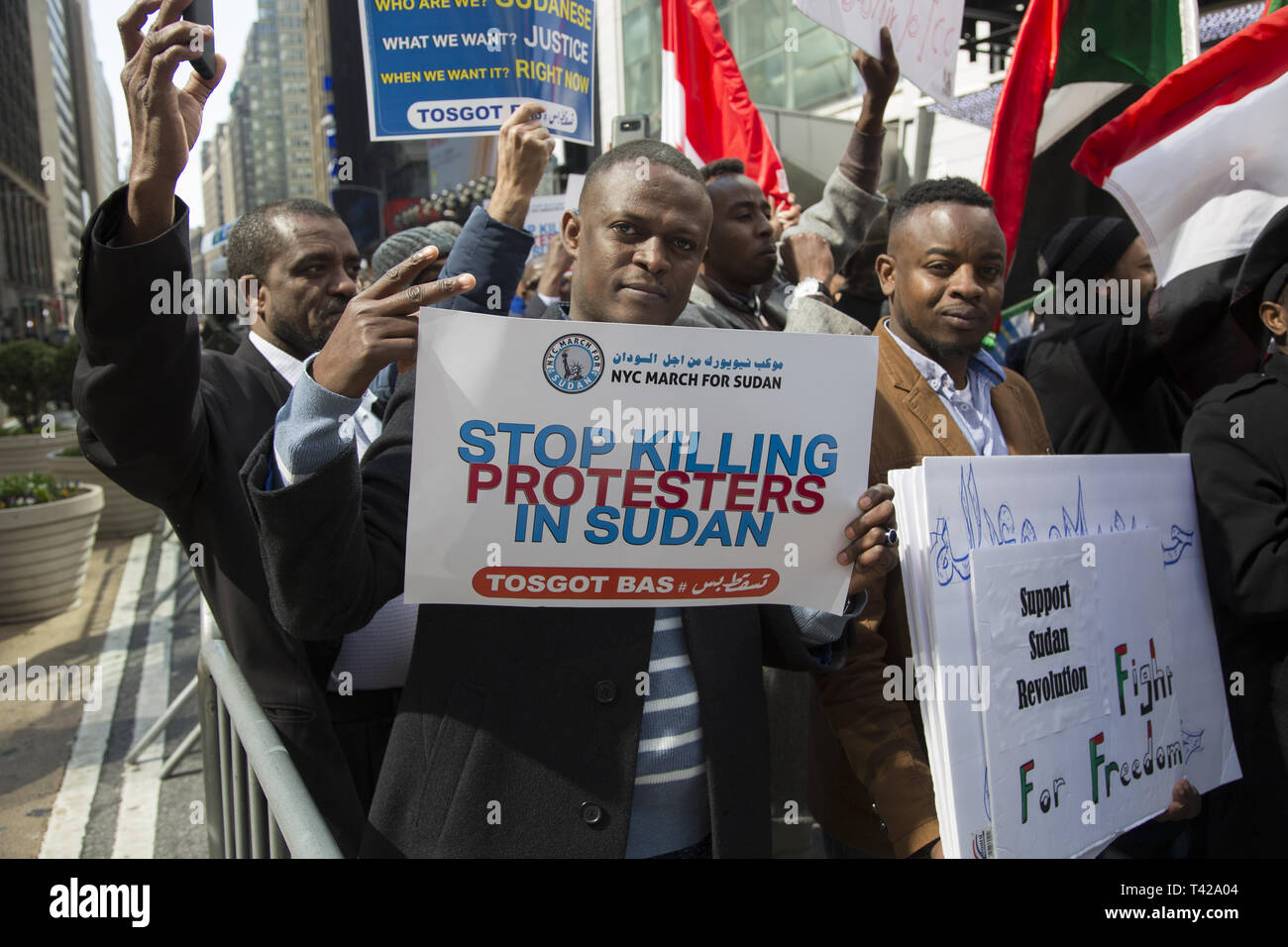 4/6/19: Days before Sudan's dictatorial president Omar al-Bashir was forced from office by a military coup, Sudanese Americans and immigrants demonstrate and march to the UN in NY City to have Bashir resign immediately from office and have democracy restored i9n Sudan. Stock Photo