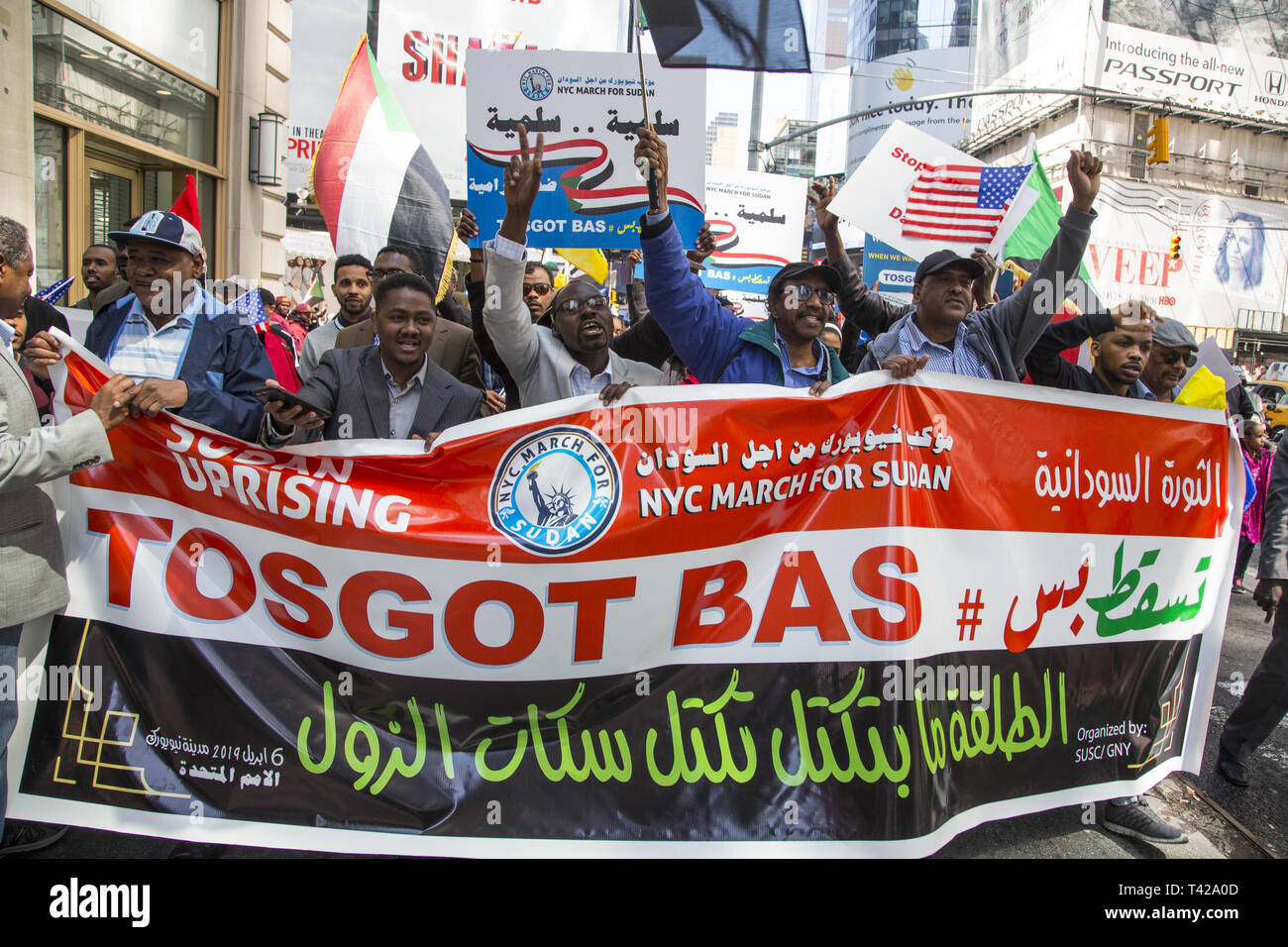 4/6/19: Days before Sudan's dictatorial president Omar al-Bashir was forced from office by a military coup, Sudanese Americans and immigrants demonstrate and march to the UN in NY City to have Bashir resign immediately from office and have democracy restored i9n Sudan. Stock Photo