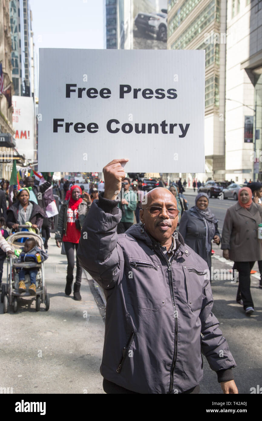 4/6/19: Days before Sudan's dictatorial president Omar al-Bashir was forced from office by a military coup, Sudanese Americans and immigrants demonstrate and march to the UN in NY City to have Bashir resign immediatly from office and have democracy restored i9n Sudan. Stock Photo