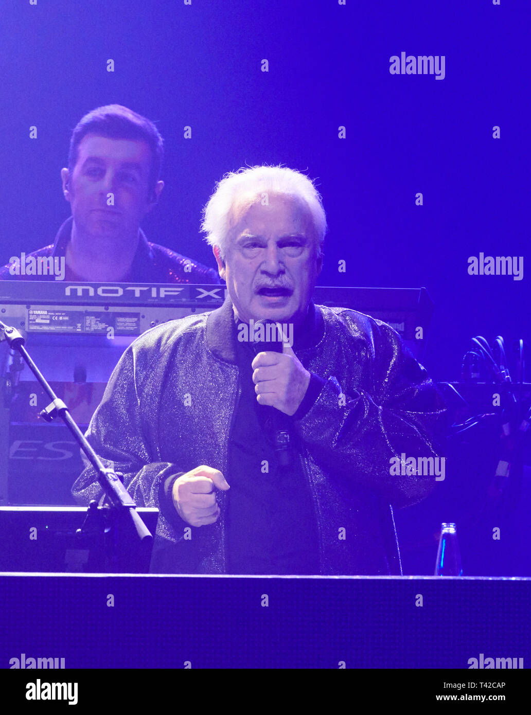 Berlin, Germany. 12th Apr, 2019. The Italian music producer and composer Giorgio Moroder sings "The Celebration of the '80s Tour" on stage at the Tempodrom for the German opening. Credit: Annette Riedl/dpa/Alamy Live News Stock Photo