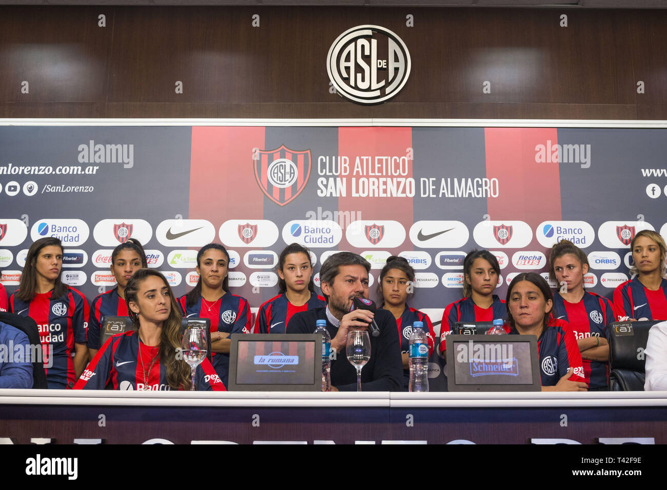 April 12, 2019 - City Of Buenos Aires, City of Buenos Aires, Argentina - SPORTS WorldNews. 2019 April 12, City of Buenos Aires, Argentina. Athletic Club San Lorenzo de Almagro Female football team sign on 2019 April 12th the first professional female football contract in Argentina on first category, after the Argentinian Football Association (AFA in Spanish) agreed on 2019 March 18 to professionalized female football.MACARENA SANCHEZ, one of the football players who fight the lasts months for Professional Female Football (left), MATIAS LAMMENS, President of Athletic Club San Lorenzo (Center), Stock Photo