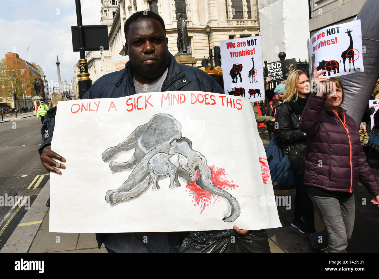 London, UK. 13th April 2019. Hundreds join the 5th Global March for Elephants and Rhinos march against extinction and trophy hunting murdering and killing animals for blood spots and ivory trade on 13 April 2019, London, UK. Credit: Picture Capital/Alamy Live News Stock Photo
