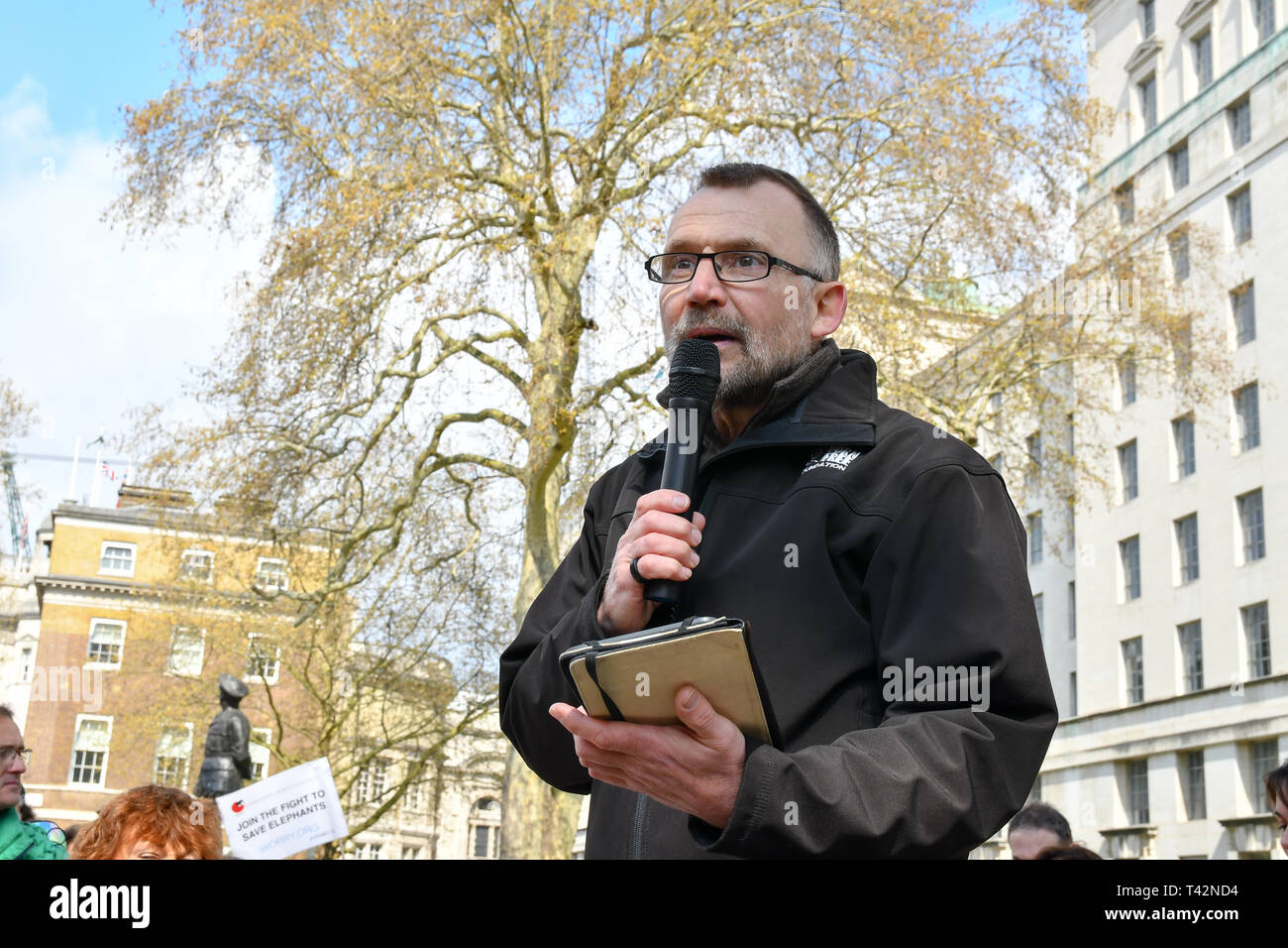 London, UK. 13th April 2019. Speaker Eduardo Goncalves - Founder - Campaign to Ban Trophy Hunting rally at the 5th Global March for Elephants and Rhinos march against extinction and trophy hunting murdering and killing animals for blood spots and ivory trade outside downing street on 13 April 2019, London, UK. Credit: Picture Capital/Alamy Live News Stock Photo