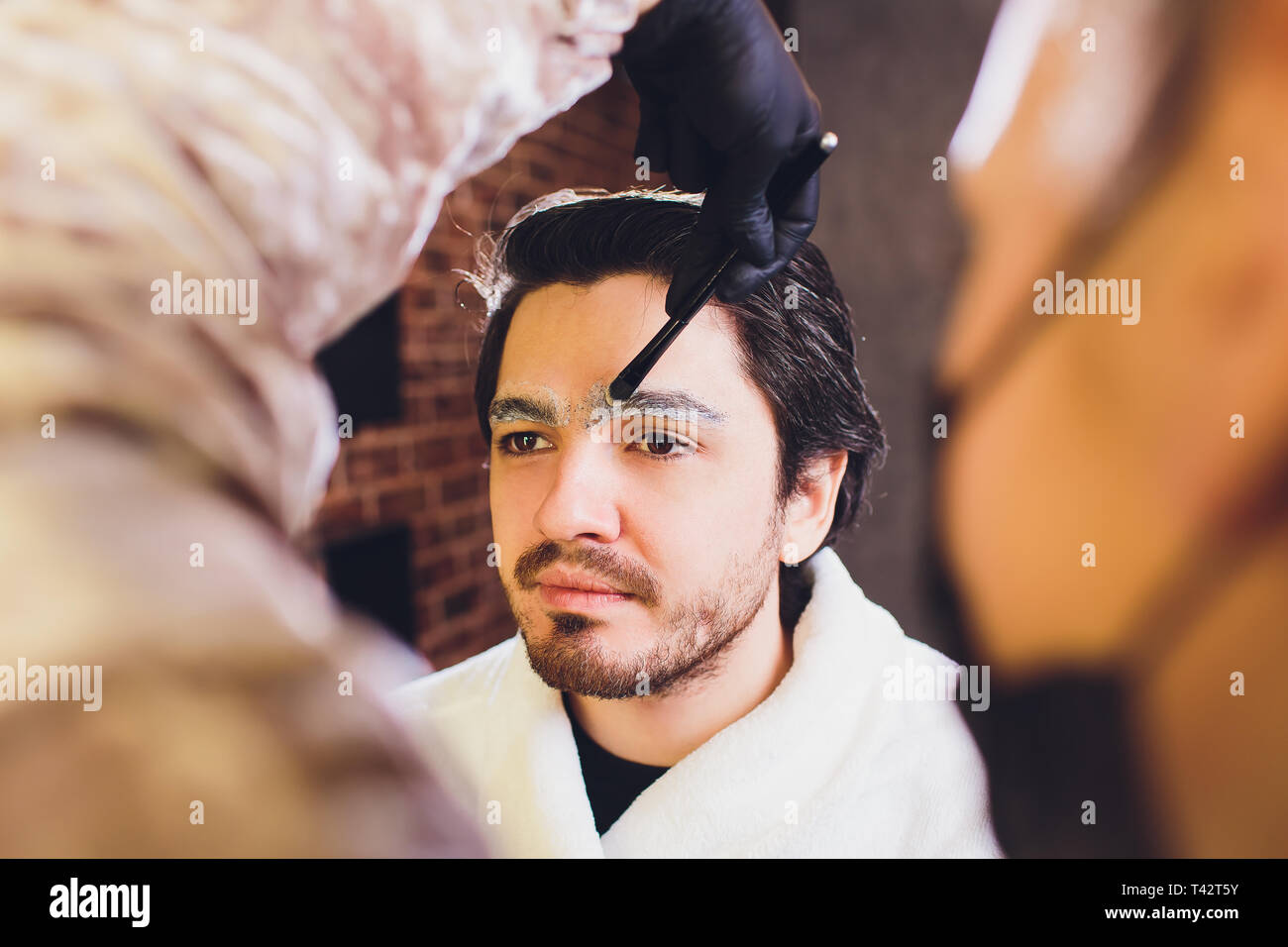 Threading eyebrows hi-res stock photography and images - Alamy