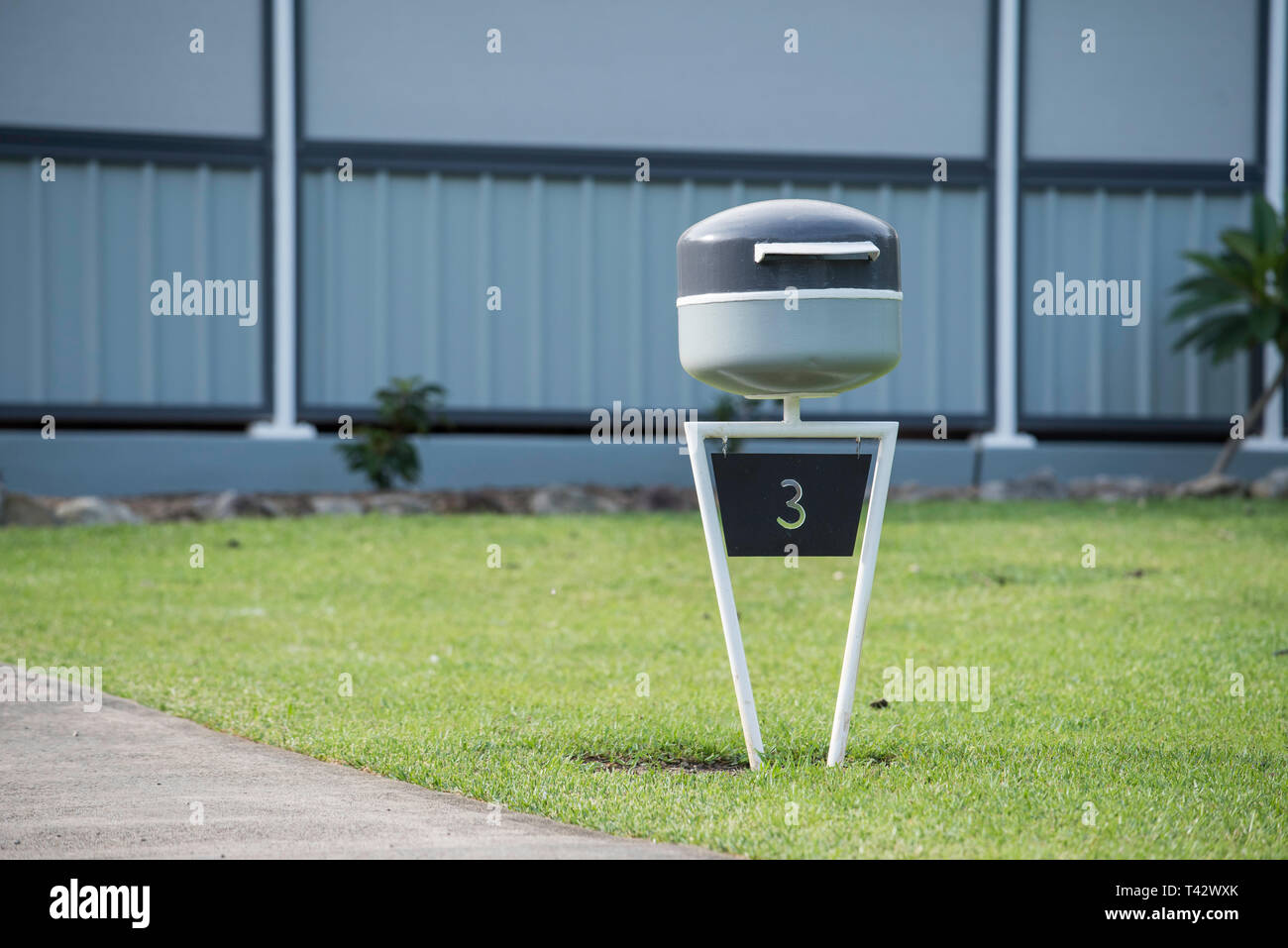 A modernist almost 60's space age letterbox (Star Warsish) in the rural village of Kioloa on the NSW south coast of Australia Stock Photo