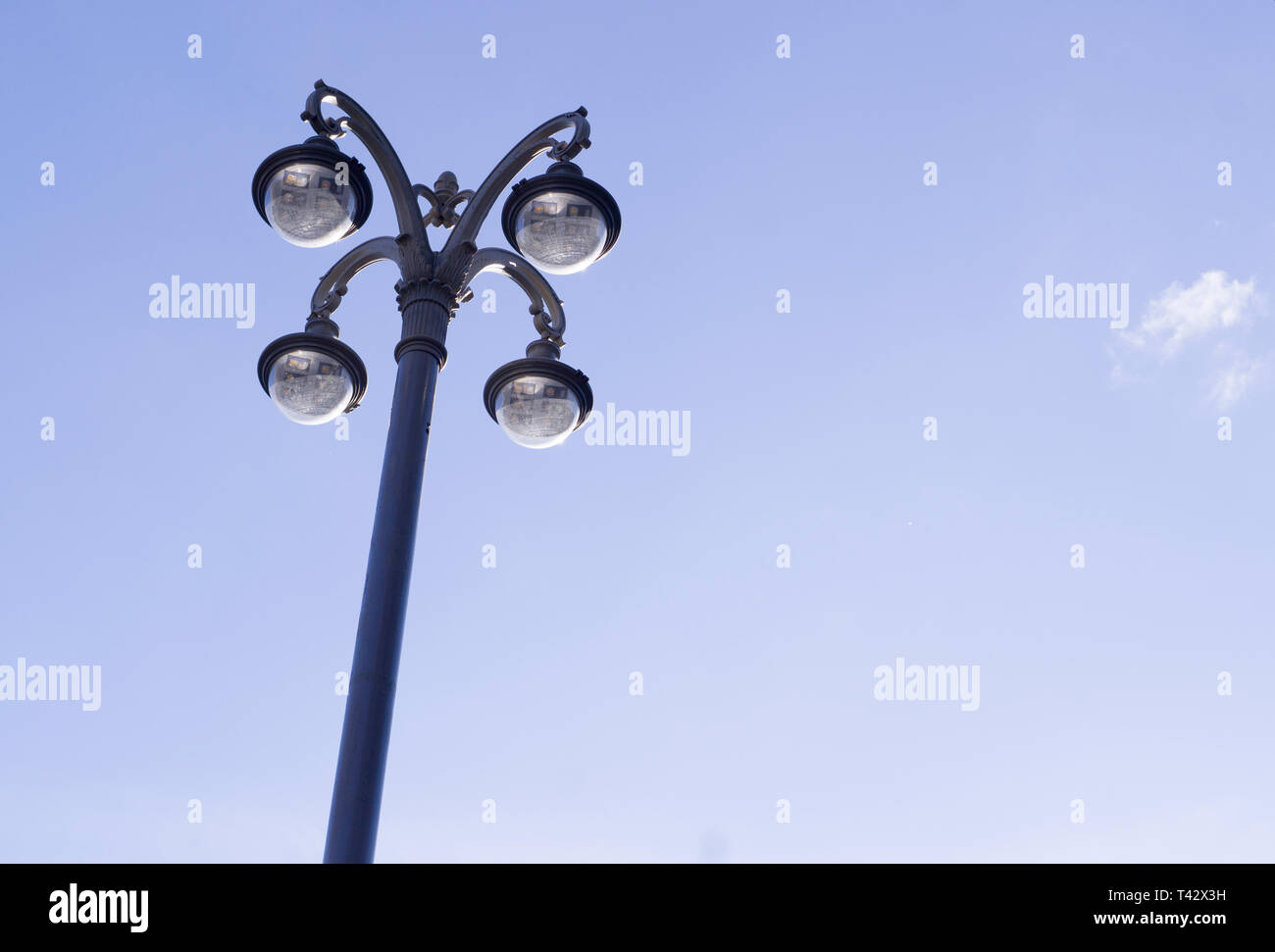 modern street lantern on the sky background. city life, lighting. Stock Photo