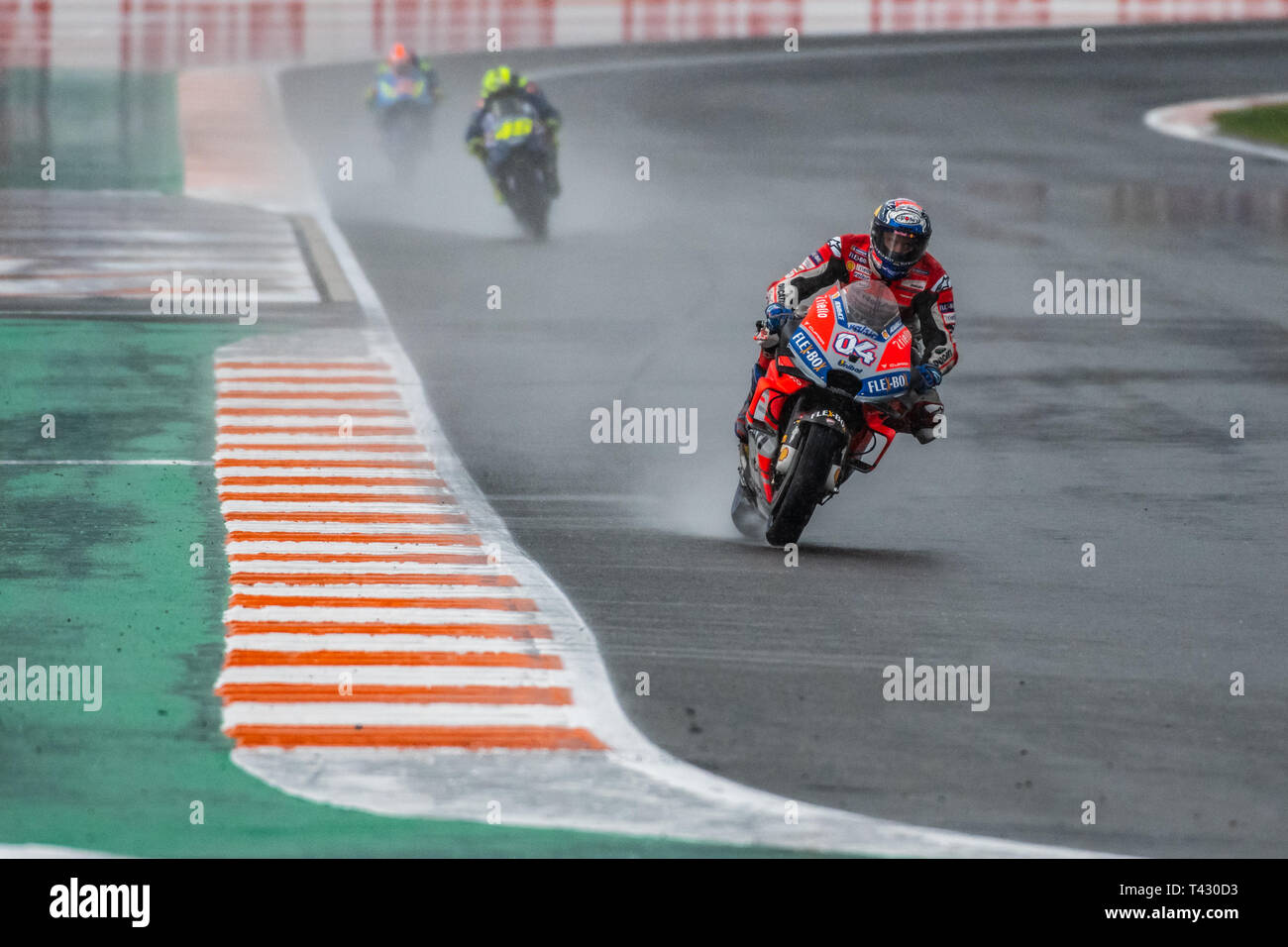 Valencia/Spain - 11/18/2018 - #04 Andrea Dovizioso (ITA, Ducati) pulling away from #42 Alex Rins (ITA, Suzuki) and #46 Valentino Rossi (ITA, Yamaha) d Stock Photo