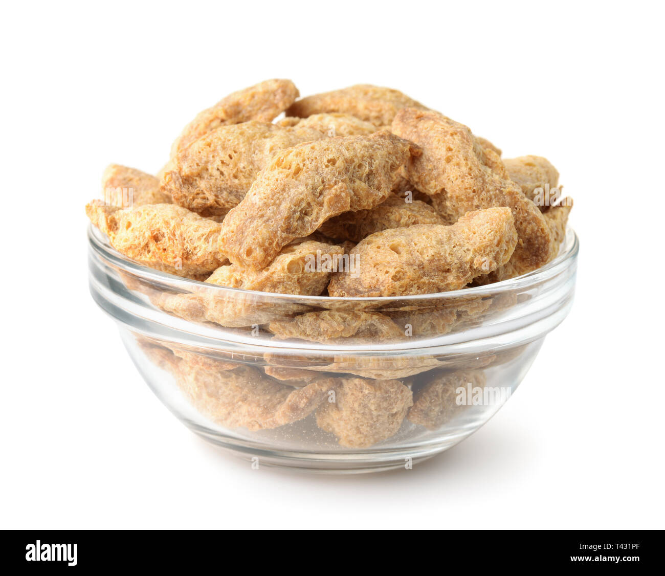 Bowl of dry soya chunks isolated on white Stock Photo