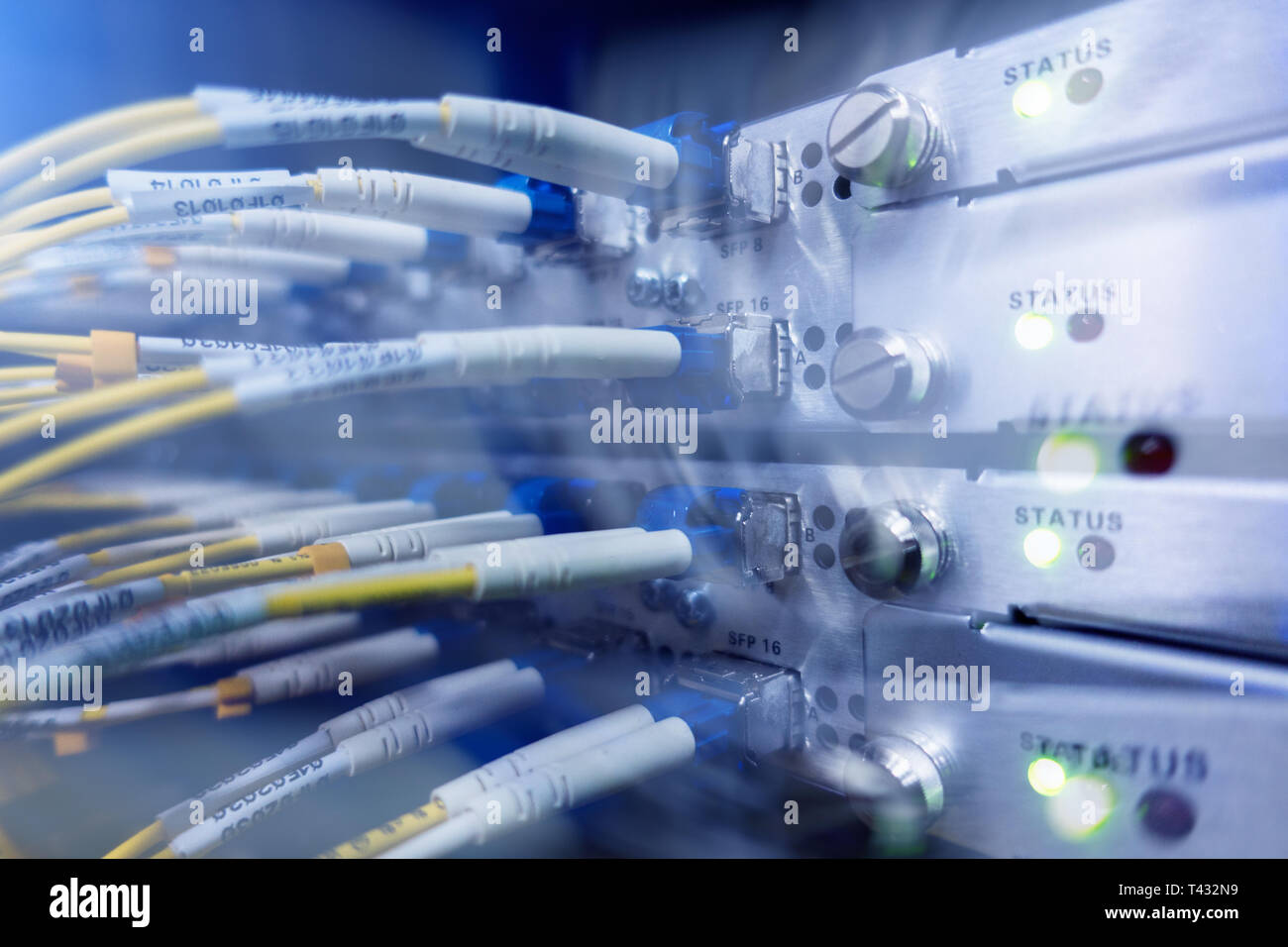 Optical switch and colorfull FC cables connected. Datacenter. Close up