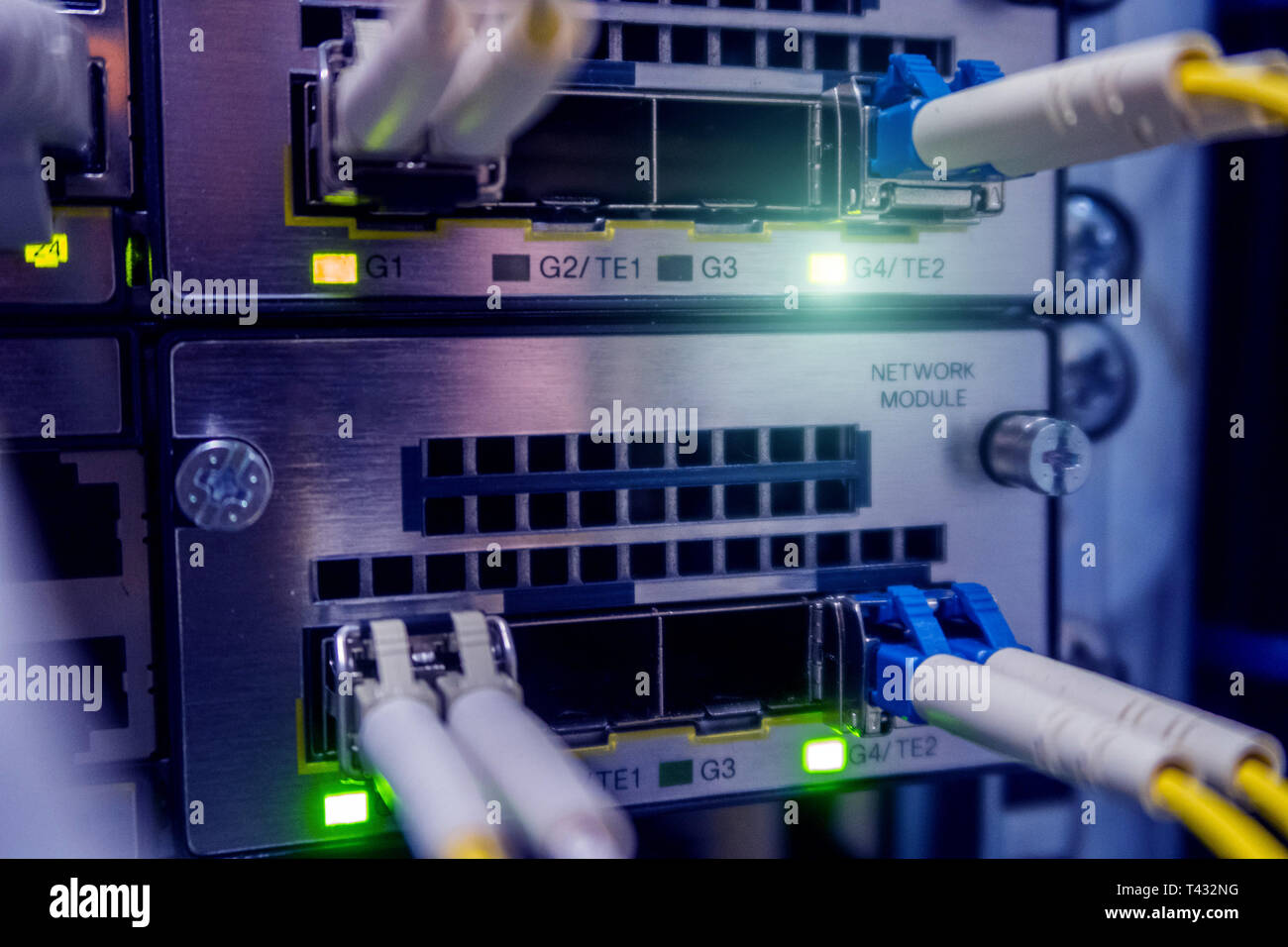 Optical switch and colorfull FC cables connected. Datacenter. Close up