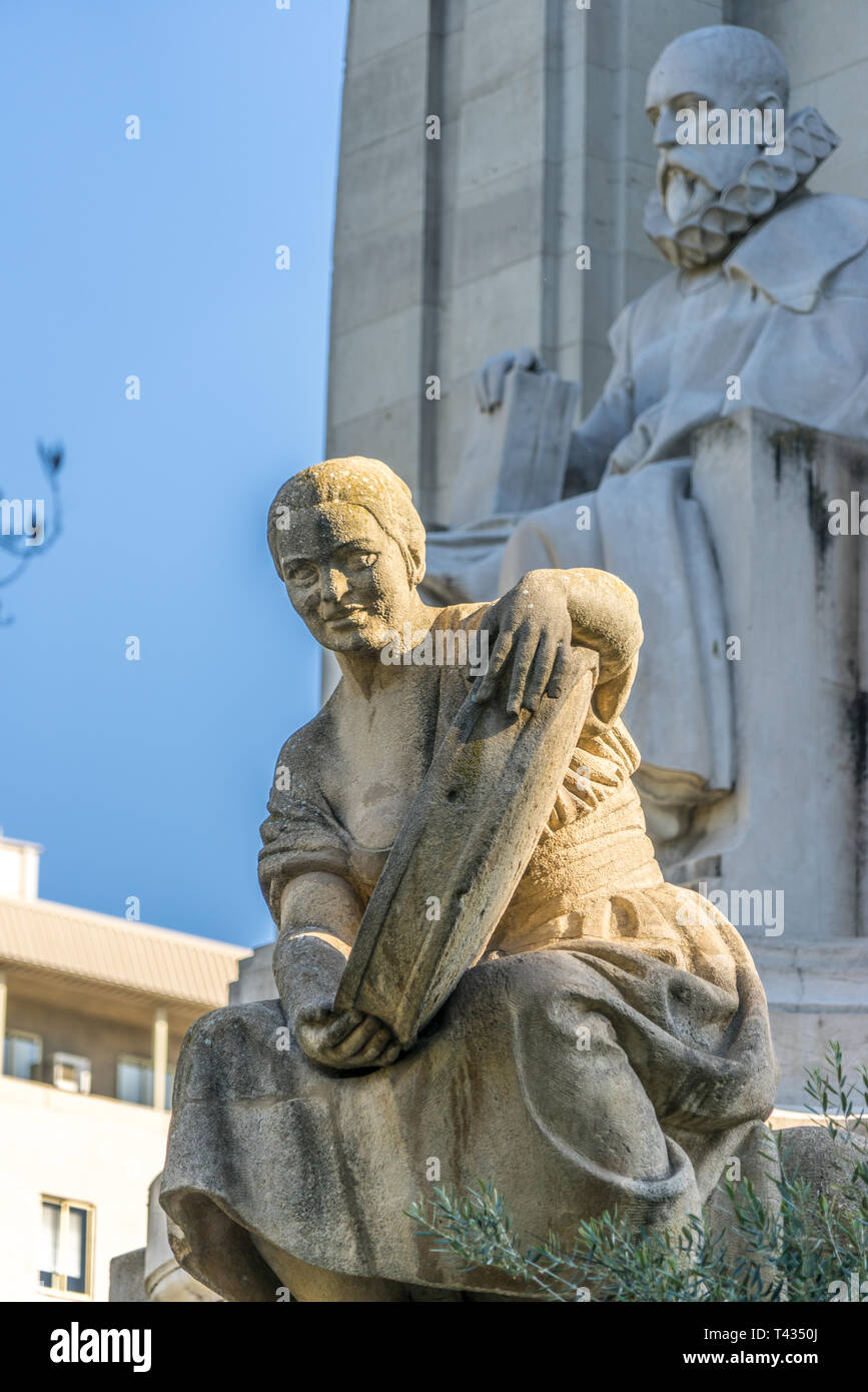 Stone statue of Aldonza Lorenzo (Dulcinea del Toboso) sculpted by Federico Coullaut-Valera from Monument to Miguel de Cervantes Saavedra in Plaza de E Stock Photo