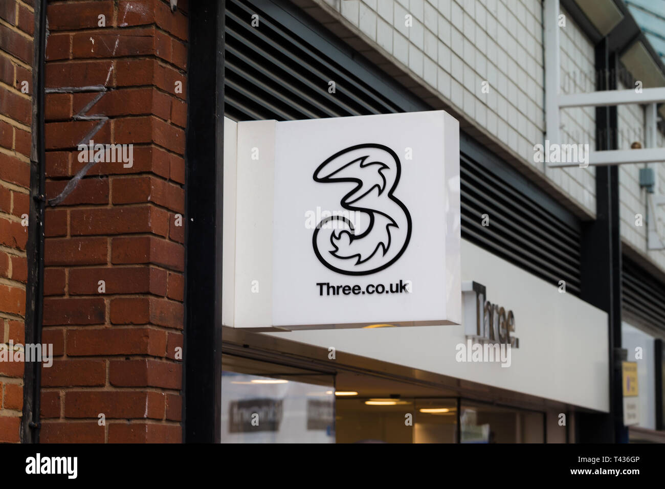 Gravesend, Kent. UK. Shop sign for mobile phone company Three Stock Photo -  Alamy