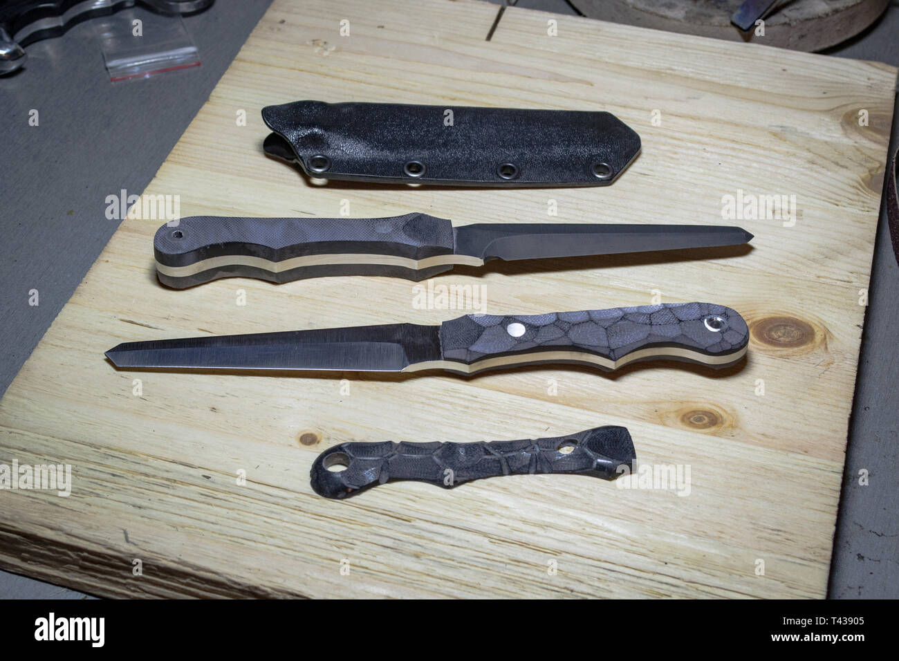 Unfinished custom stiletto knives with handle covers Stock Photo Alamy