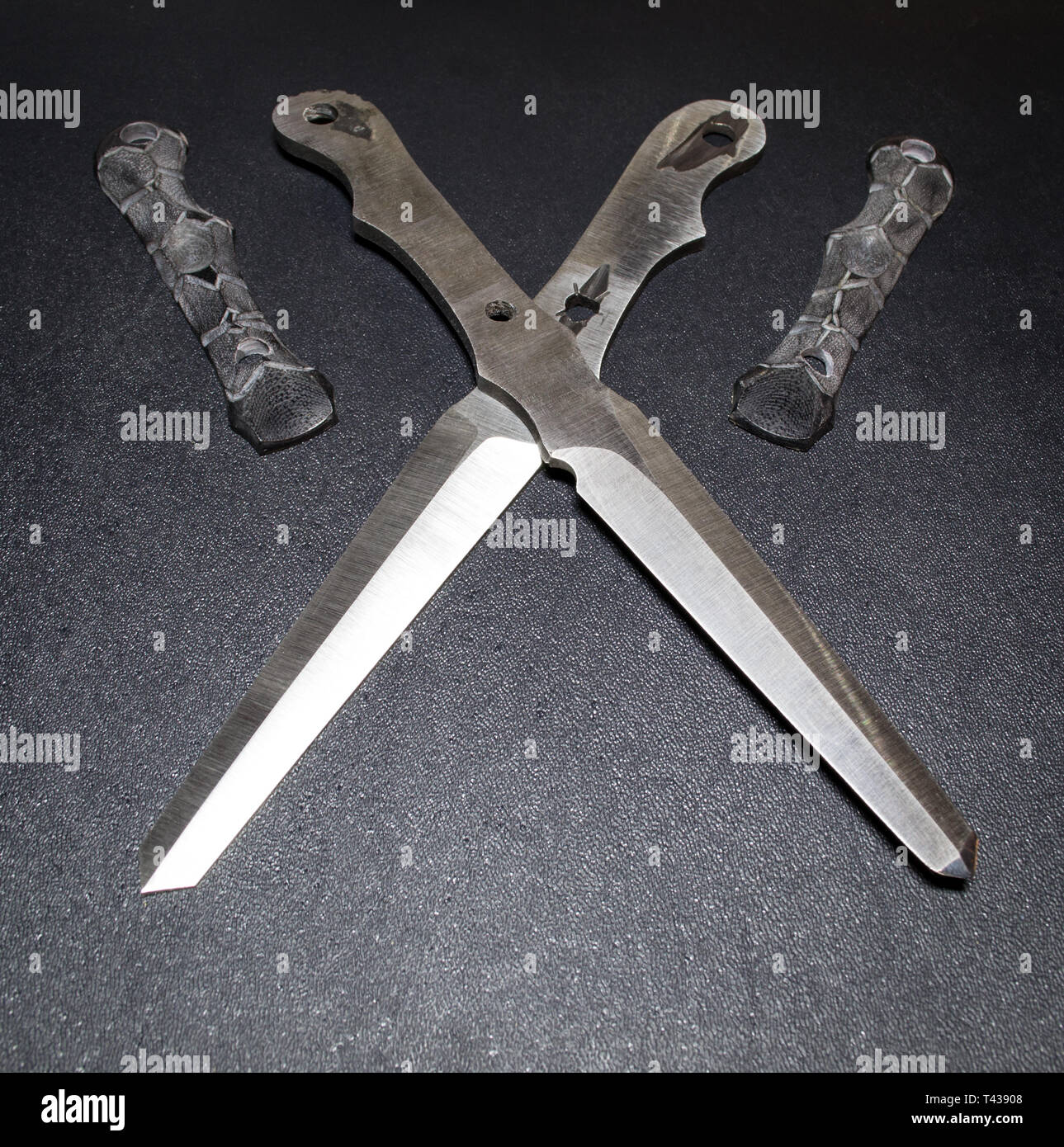 Unfinished custom stiletto knives with handle covers Stock Photo Alamy