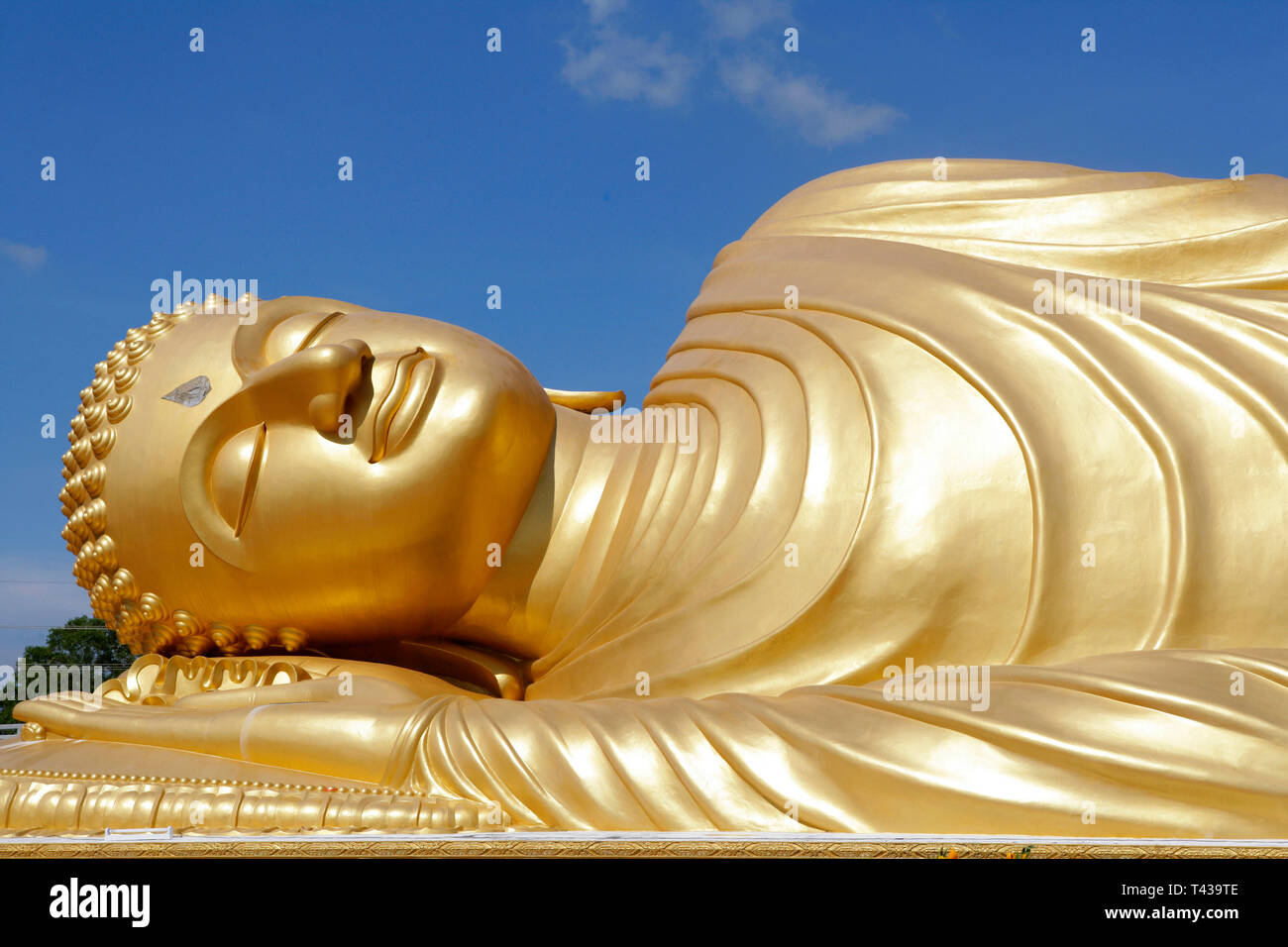 Lying golden buddha statue in the temple Wat Yai Nai, Hat Yai, Songkhla