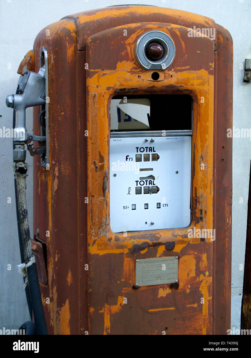 Old rusted petrol pump in Samnaun, Switzerland Stock Photo
