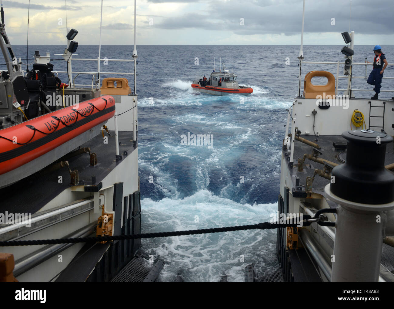 Crew members from the Coast Guard Cutter Munro (WMSL 755) launch on the cutter's 35-foot Cutter Boat to conduct fisheries boardings in the Central Pacific, Dec. 3, 2018. The Murno was on its first operational patrol and was the first National Security Cutter to visit the region. (U.S. Coast Guard photo by Petty Officer 3rd Class Matthew West) Stock Photo