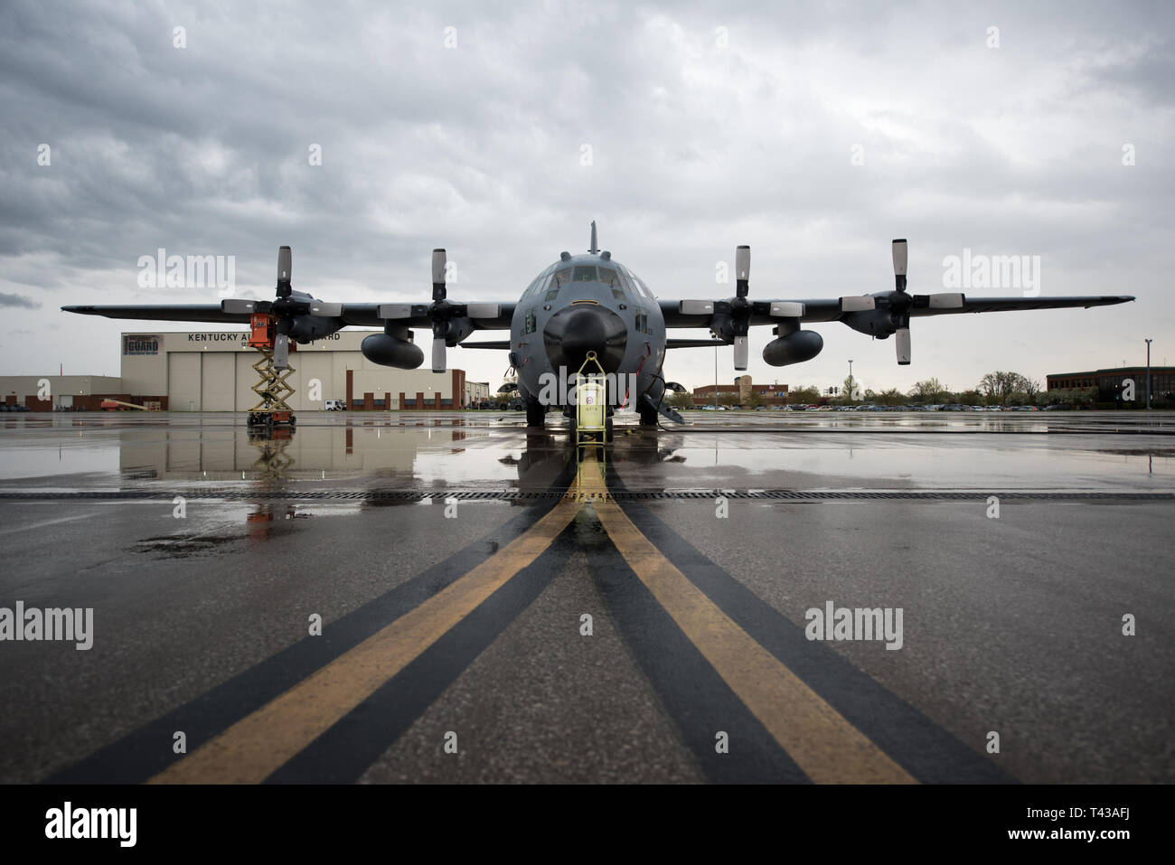 A 123rd Airlift Wing C-130 Hercules sits on the ramp at the Kentucky Air National Guard Base in Louisville, Ky., April 12, 2019, prior to this weekend’s Thunder Over Louisville air show. The Kentucky Air Guard has served as the base of operations for military aircraft appearing in the event for the past 29 years. (U.S. Air National Guard photo by Phil Speck) Stock Photo