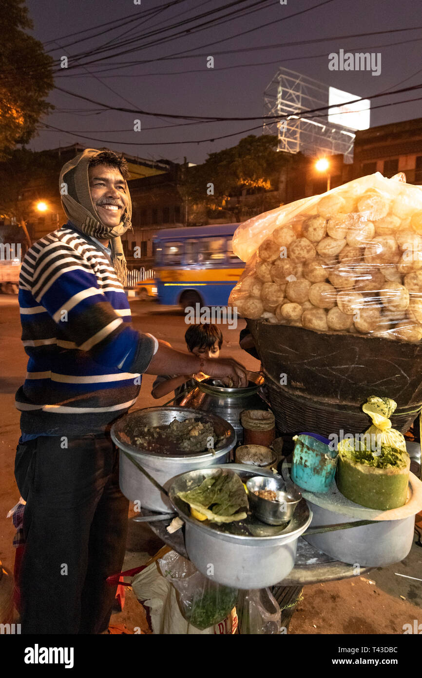 Vertical view of a street vendor selling phuchka in Kolkata aka Calcutta, India. Stock Photo