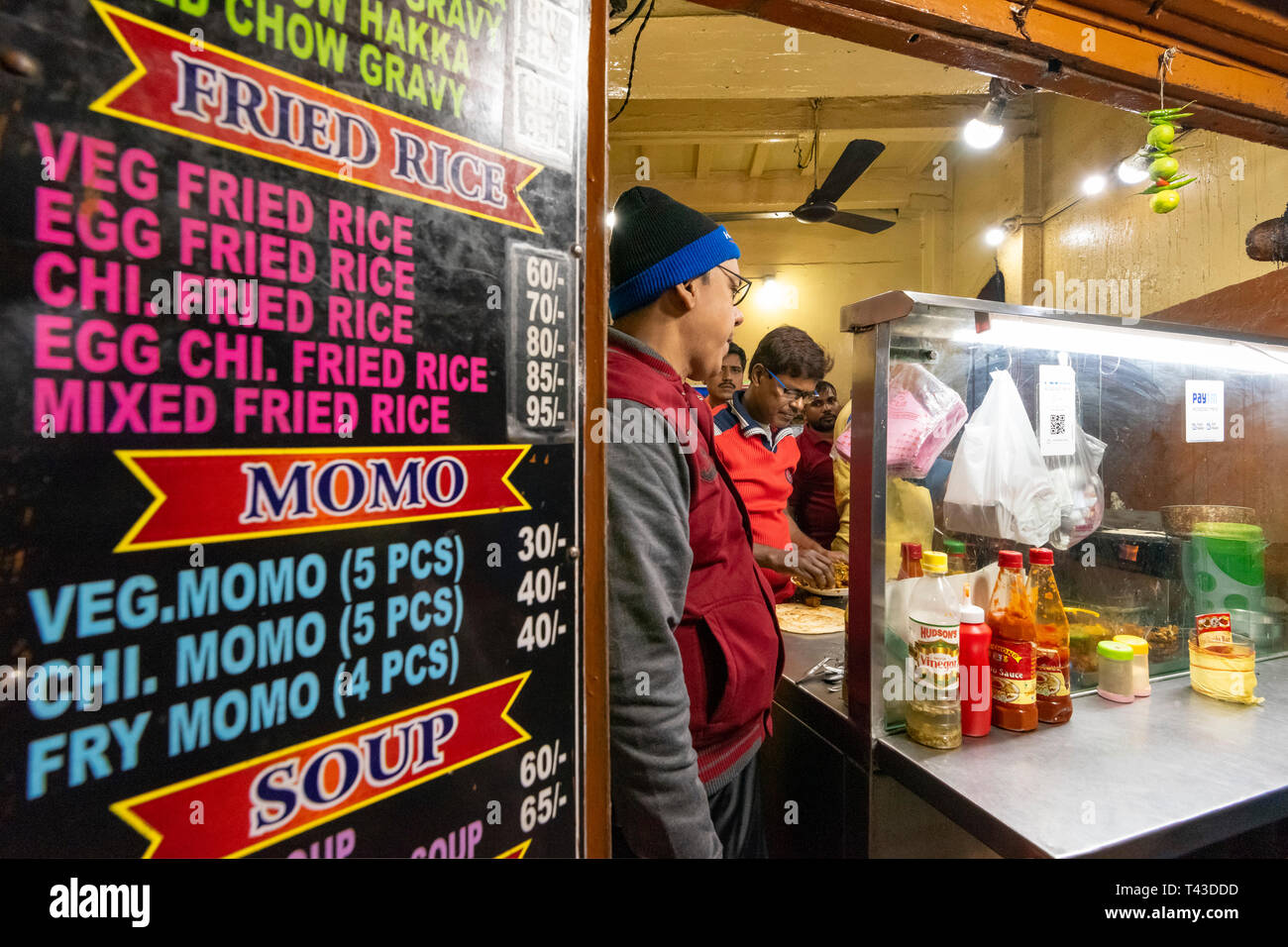 Horizontal view of the menu at a streetfood stall in Kolkata aka Calcutta, India. Stock Photo