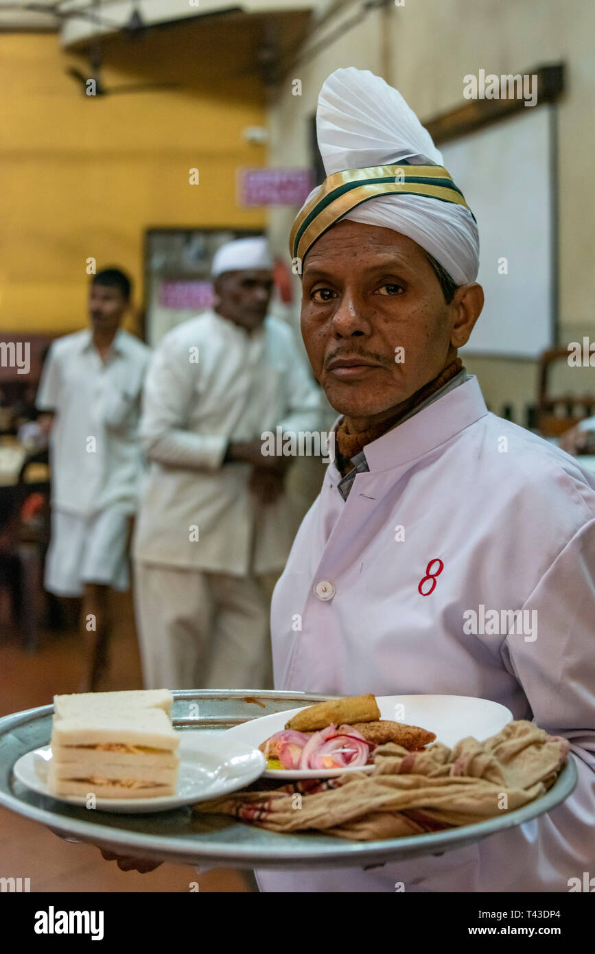 Vertical Portrait Of A Waiter Inside The Famous College Street Coffee House In Kolkata Aka Calcutta India Stock Photo Alamy