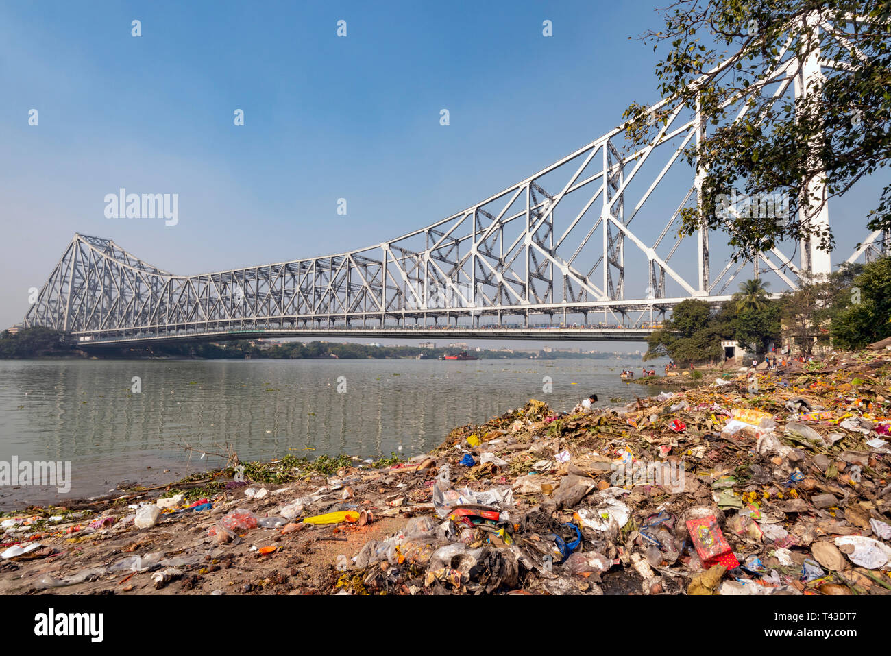 Horizontal view of the plastic pollution collecting on the banks of the river Hooghly in Kolkata aka Calcutta, India. Stock Photo