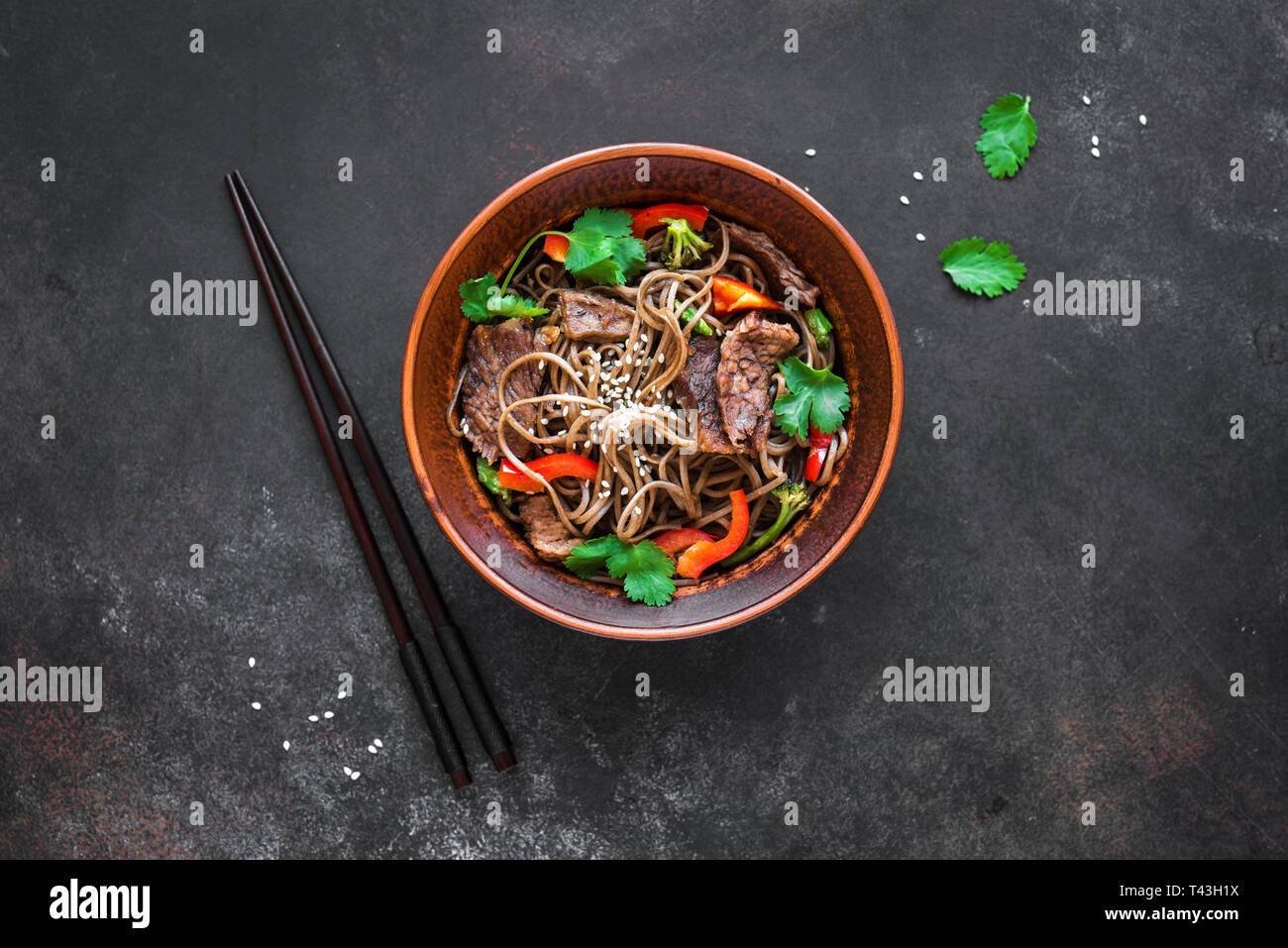 Stir fry with soba noodles, beef and vegetables. Asian healthy food