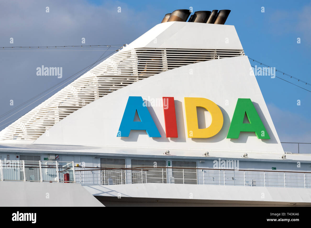 AIDA logo at the funnel of cruise ship AIDAaura. AIDA Cruises is one of