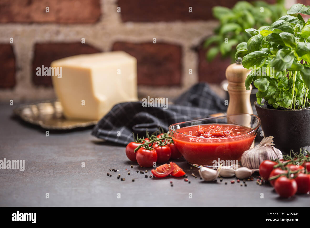Tomato sauce tomatoes basil pasta spaghetti olive oil and parmesan. Stock Photo