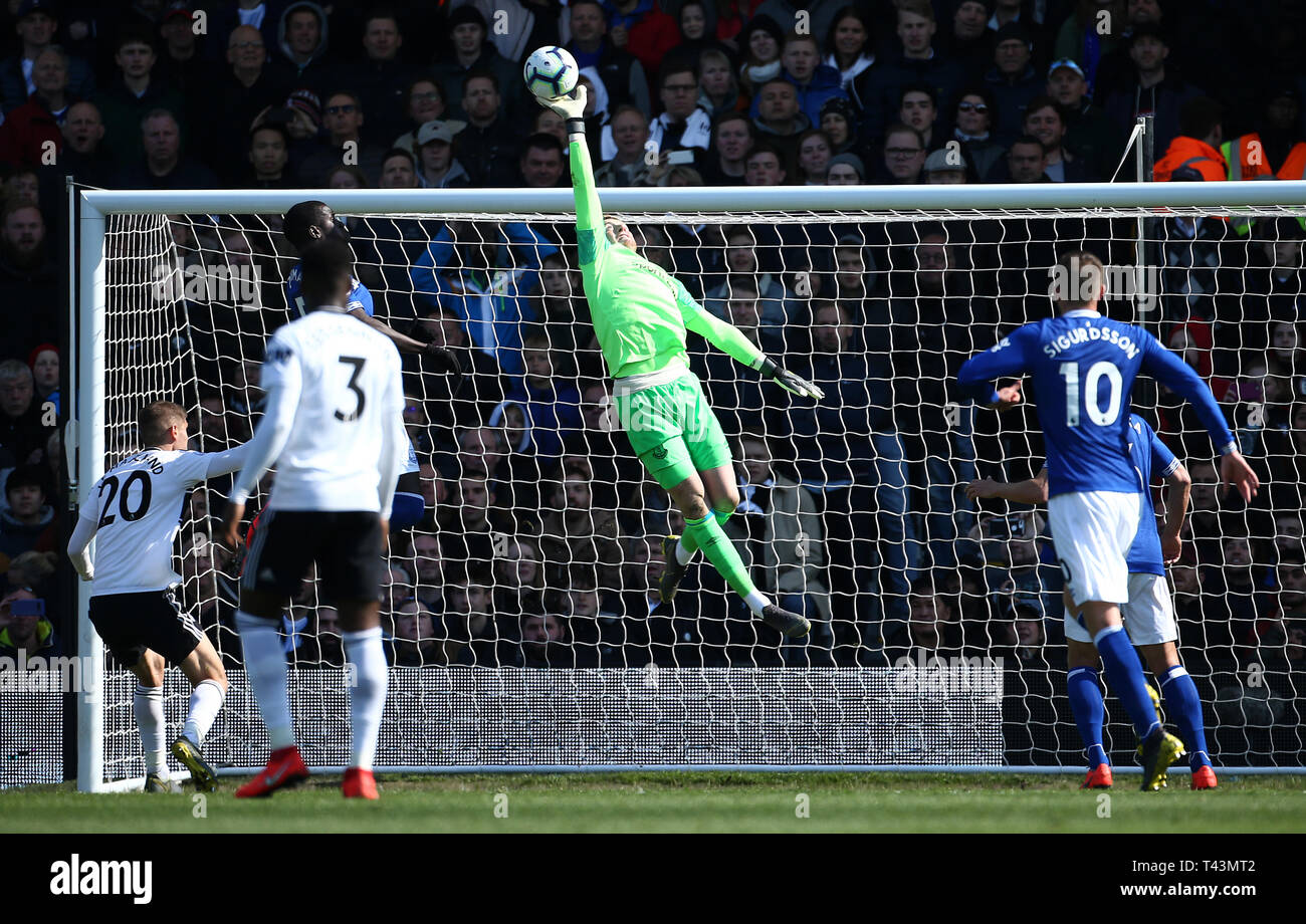 Everton goalkeeper Jordan Pickford makes a save during the Premier League  match at Craven Cottage, London Stock Photo - Alamy