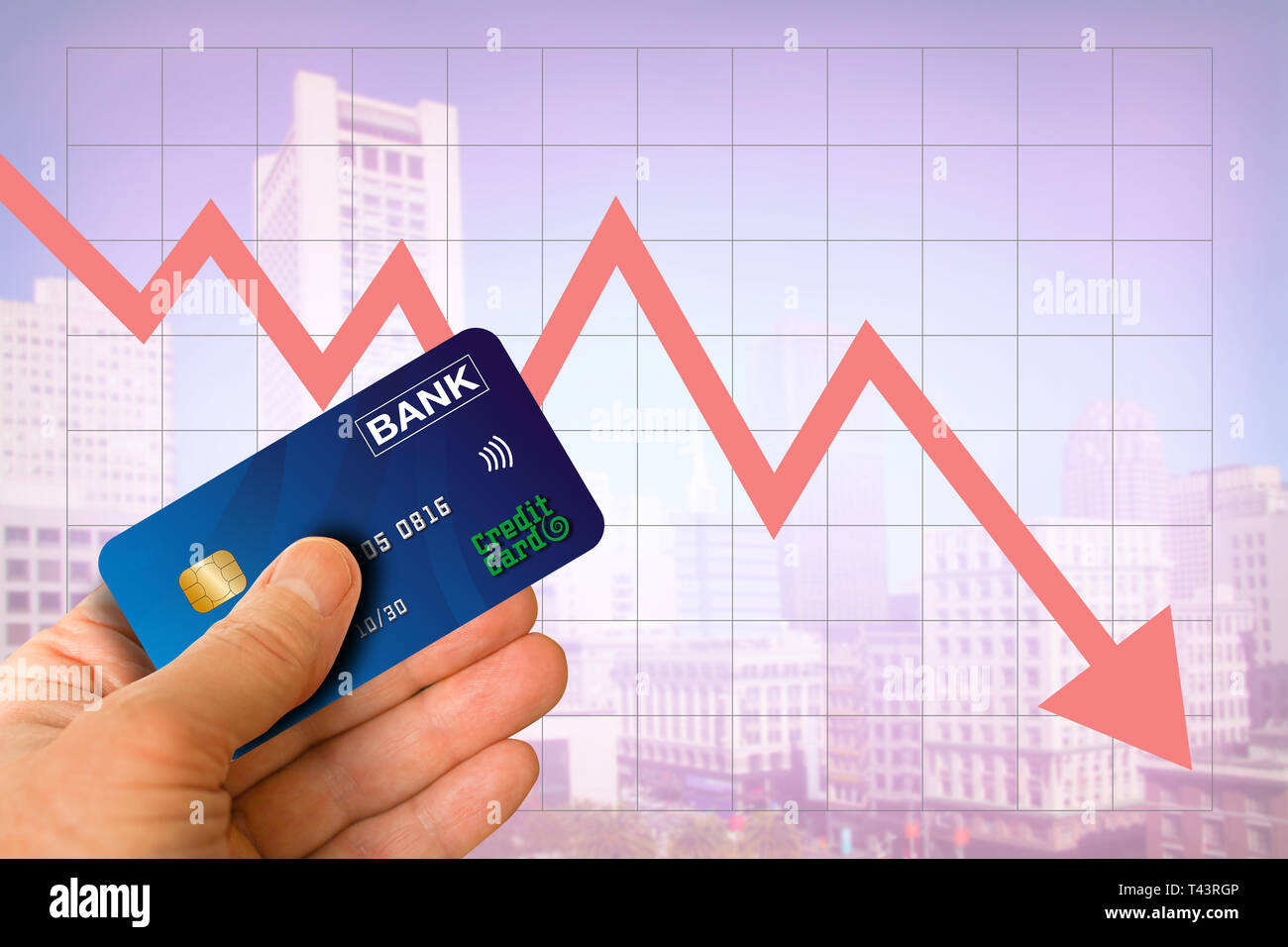 Hand holding credit card from bank with cityscape and red arrow going