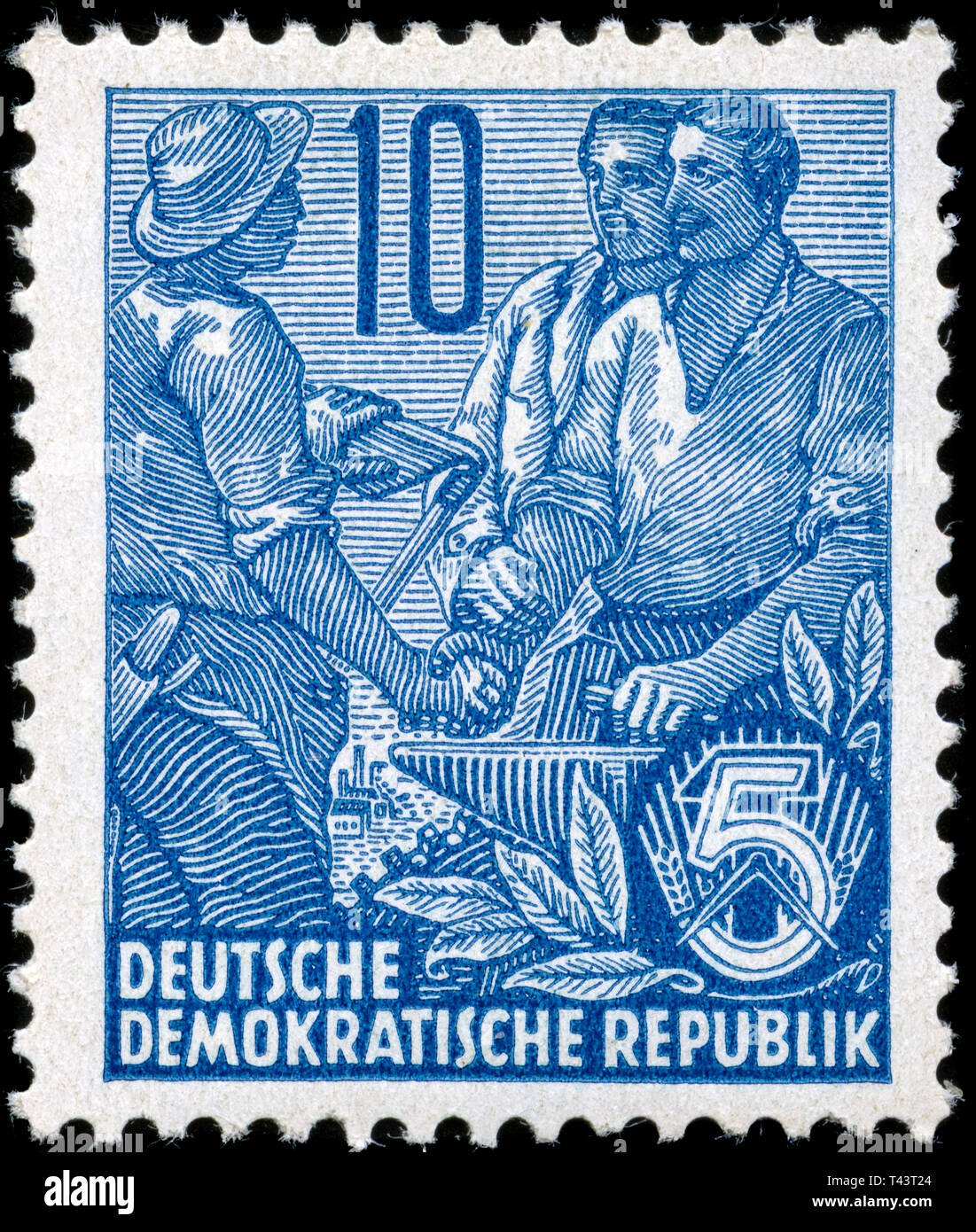 Postage stamp from East Germany (DDR) in the Five-year Plan series issued  in 1957 Stock Photo - Alamy