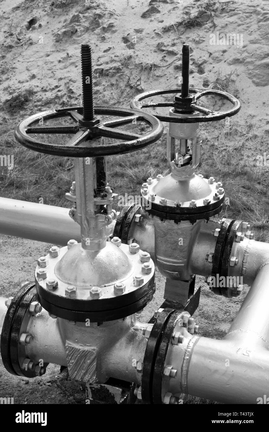 Oil latch on a pipeline . Transfer of resources . Refinery plant Stock Photo