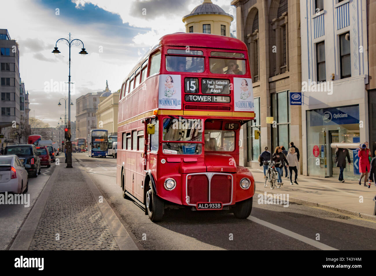 London Bus Route 15 Heritage Routemaster makes it's way along The Strand on it's way to Tower Hill, London ,UK Stock Photo