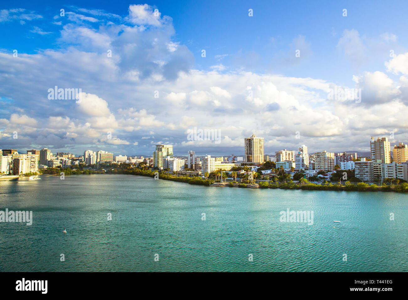 View of Condado area of San Juan Puerto Rico with bay and buildings on a day with clouds and sun Stock Photo