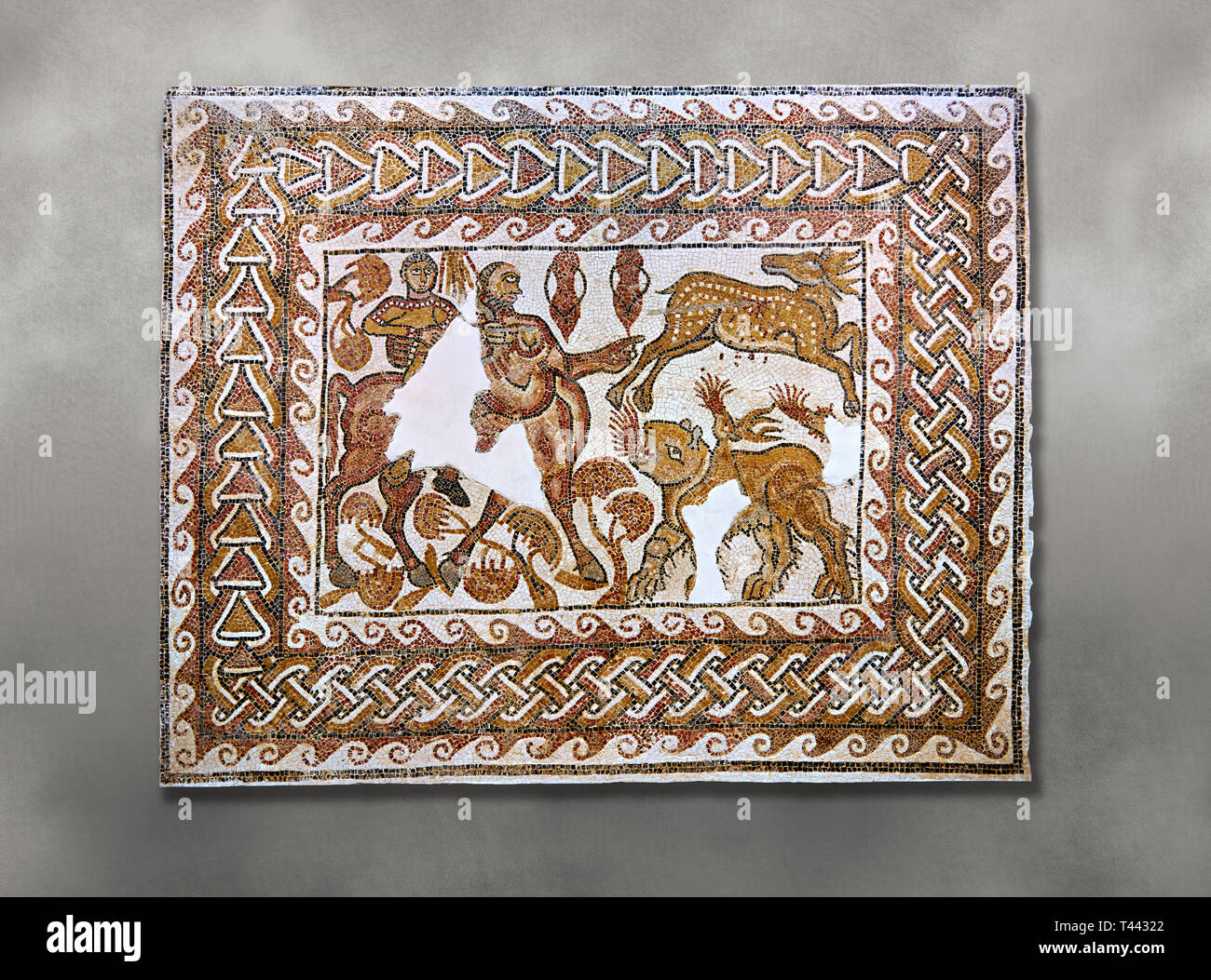 Roman mosaic depicting The Education of Achilles by the Centaur Chiron. Achilles , left, is depicted riding a centaur ( mosaic of its body s missing)  Stock Photo