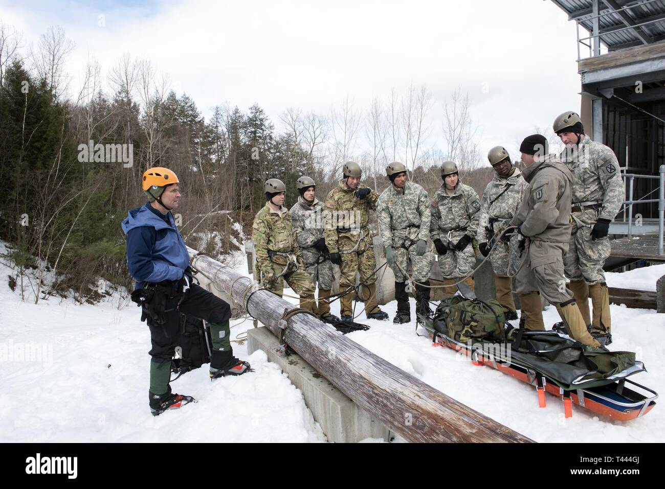 Secretary of the Army Dr. Mark T. Esper observes students in the