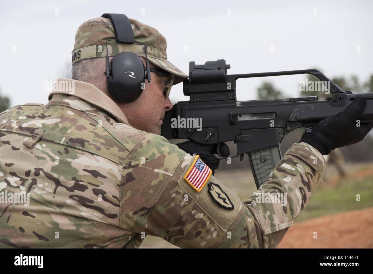 U.S. Army Brig. Gen. Ray Davis, National Guard Bureau, Army National Guard  Assistant Director of Aviation and Safety, fires the G36 rifle during the  German Armed Forces Proficiency Badge qualification, March 16,