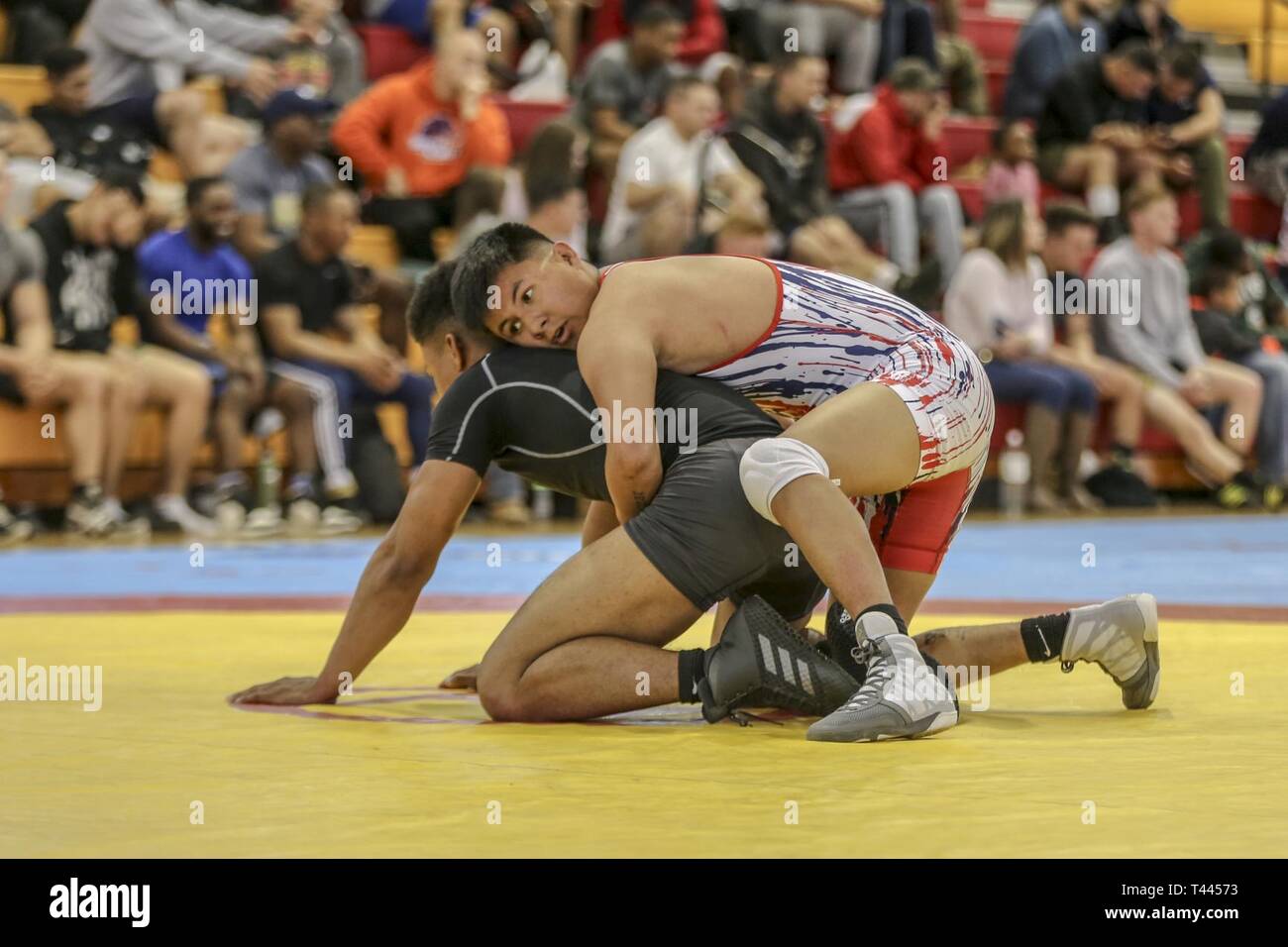 Active duty Marines and Sailors compete in the Lejeune Open wrestling