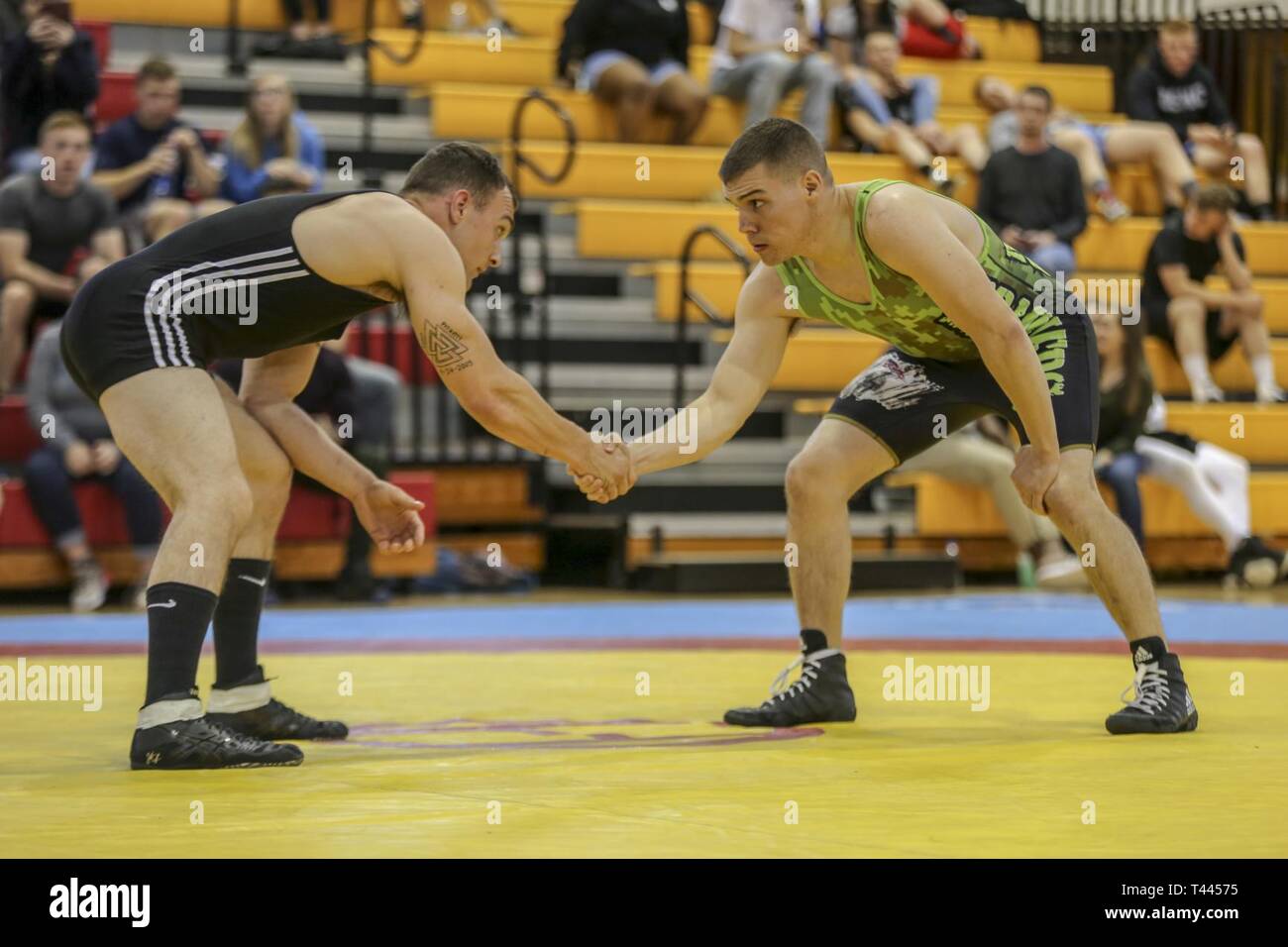 Active duty Marines and Sailors compete in the Lejeune Open wrestling