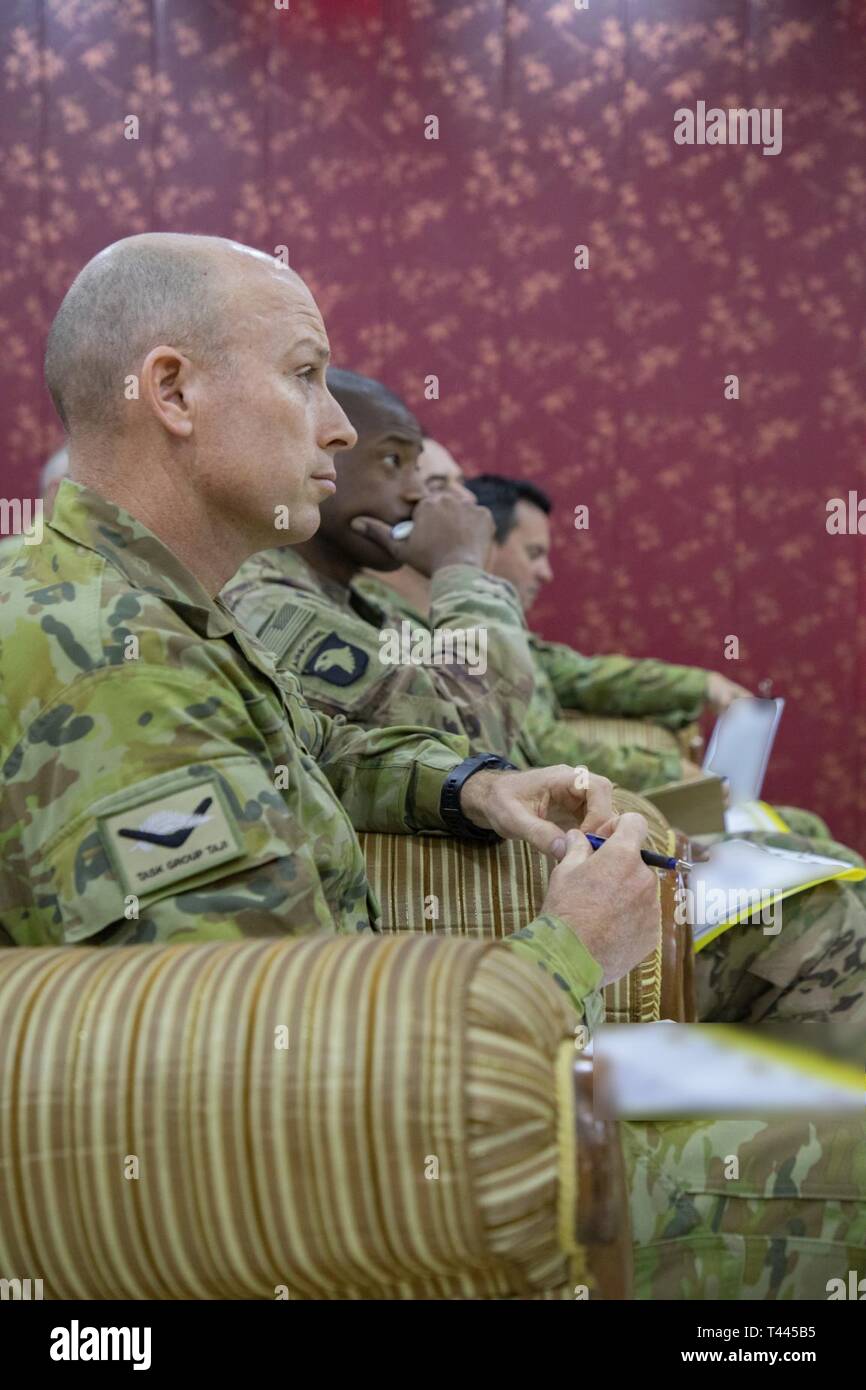 Senior leaders from Task Force Baghdad Operations Command and Task Group Taji 8 (TGT-8) listen to Brig. Gen. Husaian Mandel Jarih review the training delivered by the 2nd Non-Commission Officer School of Infantry (SIN-CO2) at Camp Taji, Iraq, March 16, 2019. The purpose of the review was to determine the effectiveness of training following recent operations in the Baghdad area. TGT-8 is a combined Australian-New Zealand Task Group that pro-vides the Iraqi Security Forces with training to enable the stabilization of areas cleared of Daesh. The Coalition will continue to stand alongside our Iraq Stock Photo