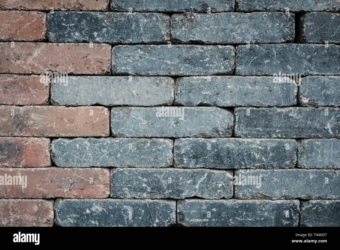 brick wall background  - tiled black and red bricks  - Stock Photo