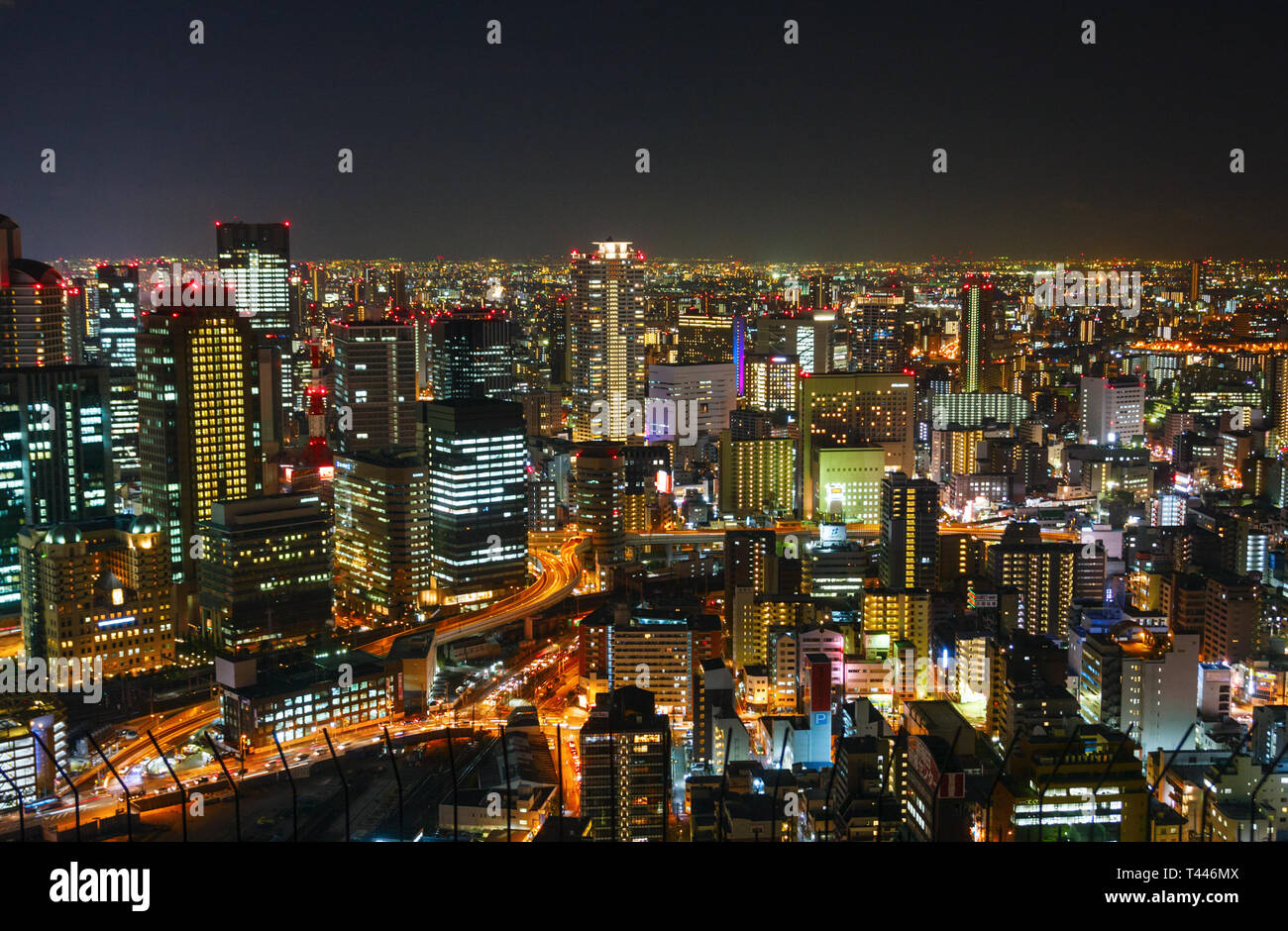 Aerial view of the Umeda district with numerous skyscrapers at night. Osaka, Japan Stock Photo