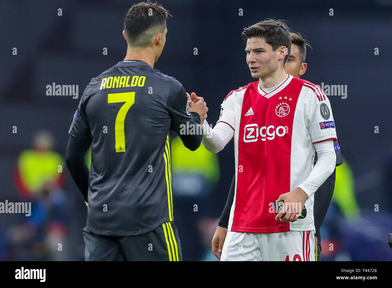 10th of april 2019 Amsterdam, The Netherlands Soccer Champions League Ajax v Juventus   Christiano Ronaldo of Juventus, Jurgen Ekkelenkamp of Ajax Stock Photo